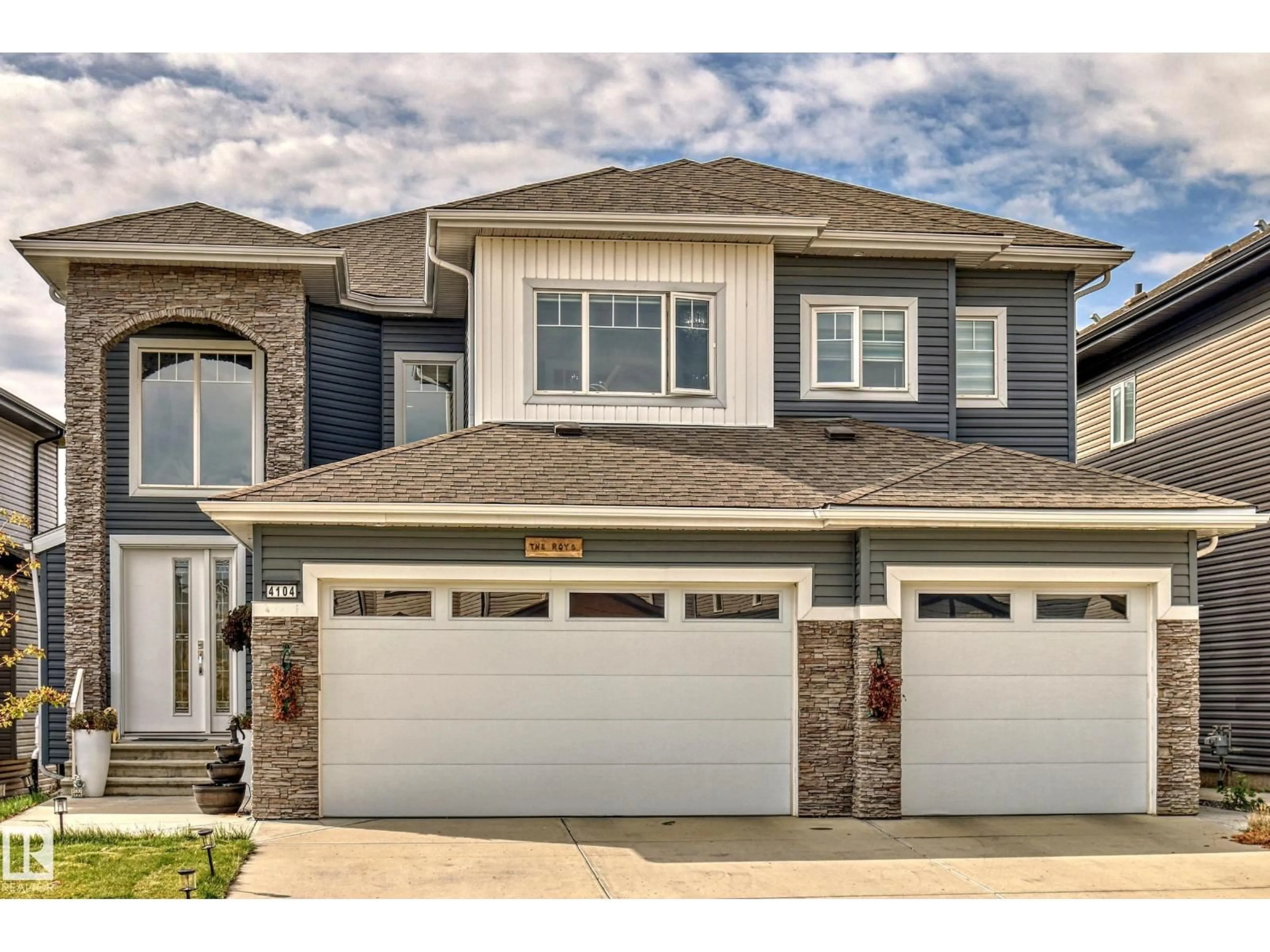 Home with vinyl exterior material, street for 4104 8 ST, Edmonton Alberta T6T0T3