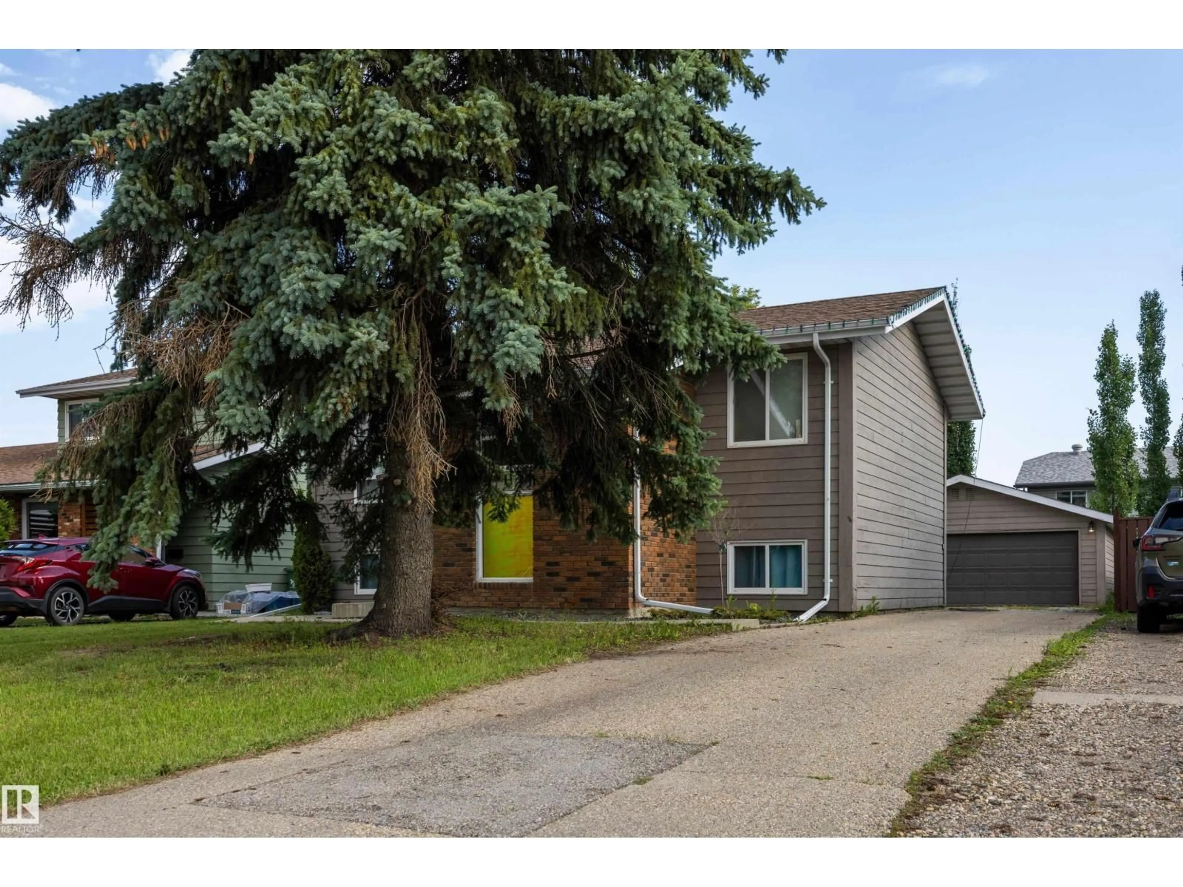 Home with vinyl exterior material, street for 4810 55 AV, Beaumont Alberta T4X1J8