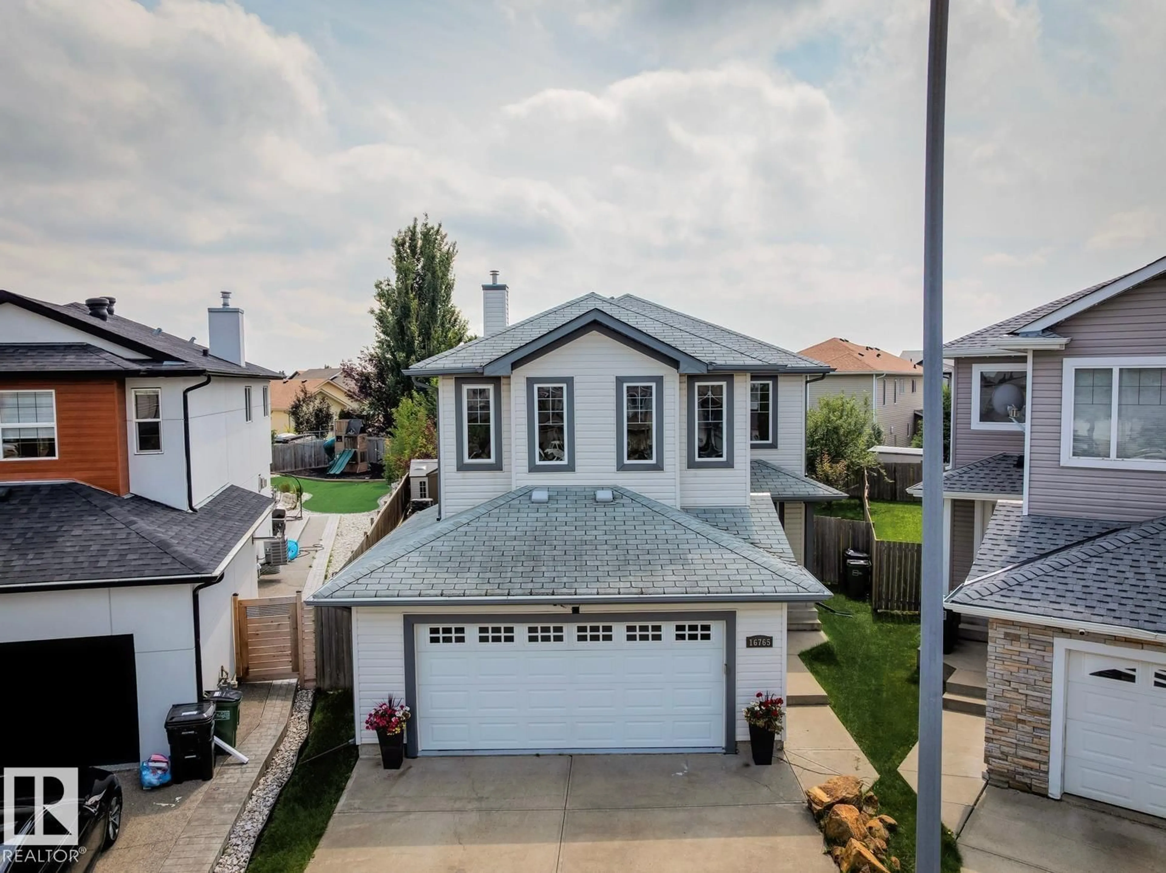 A pic from outside/outdoor area/front of a property/back of a property/a pic from drone, street for NW - 16765 119 ST, Edmonton Alberta T5X6K4