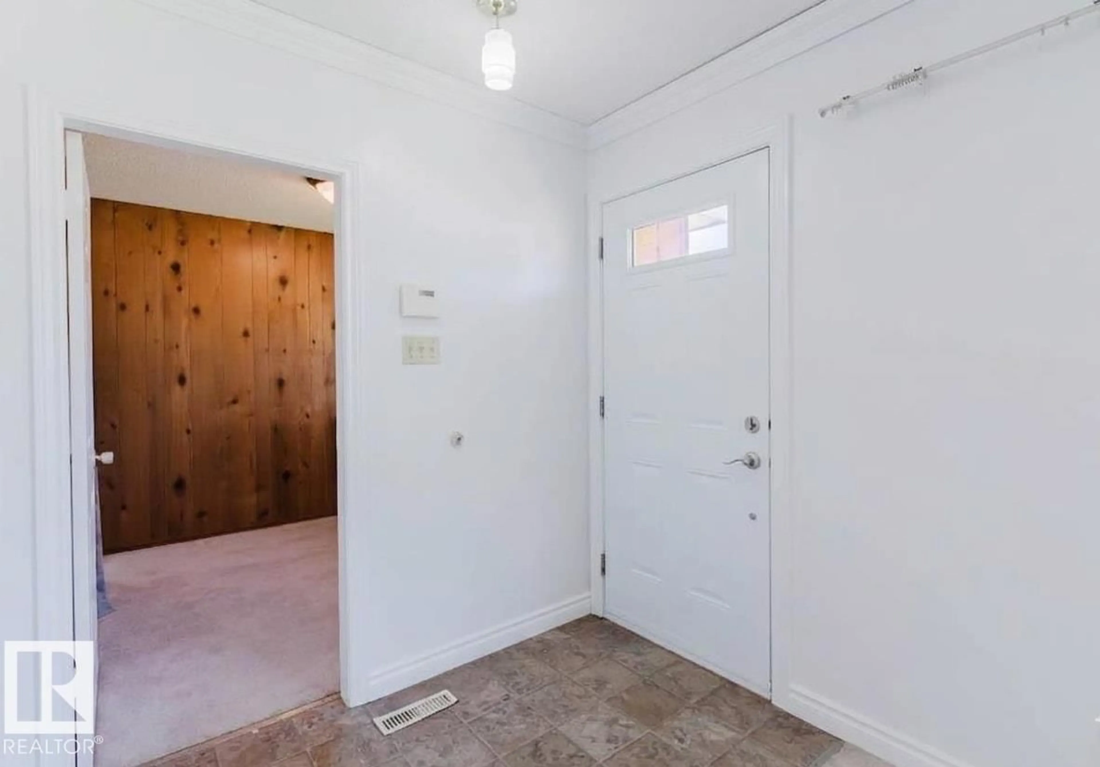 Indoor entryway for 11115 39A AV, Edmonton Alberta T6J0N6