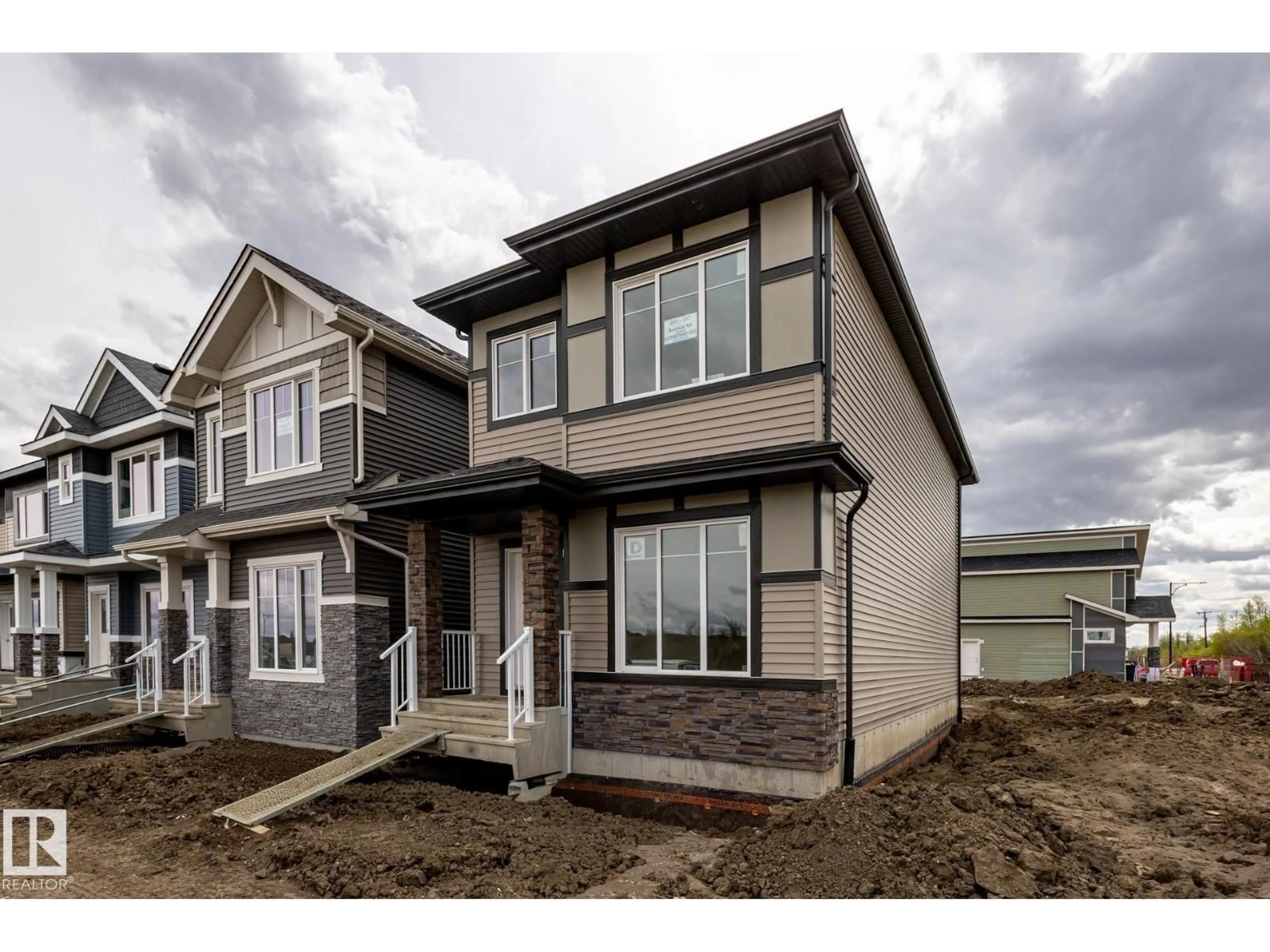 Home with vinyl exterior material, street for NE - 207 157 AV, Edmonton Alberta T5Y6K8