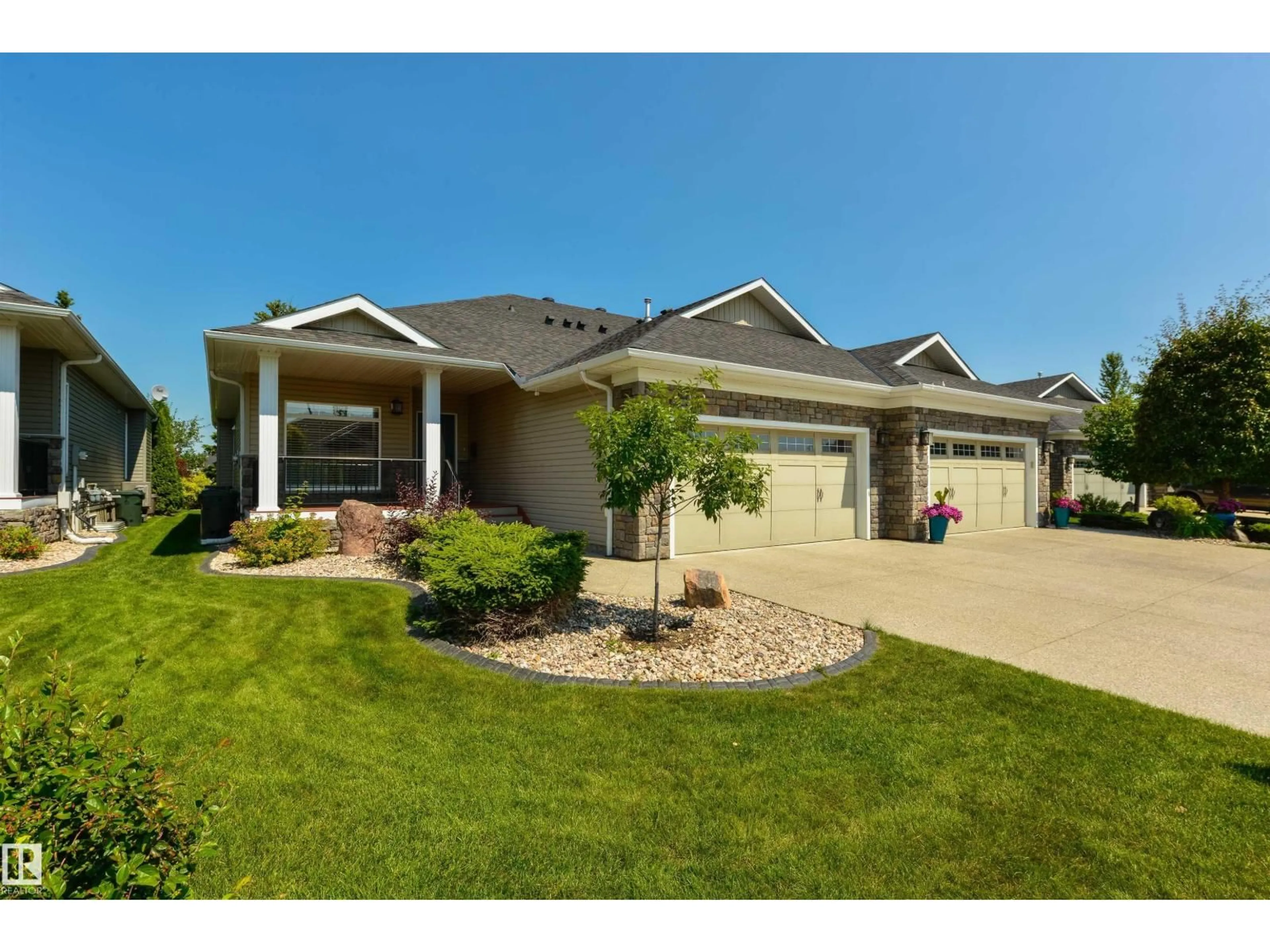 Home with vinyl exterior material, street for 38 FAIRWAY PT, Spruce Grove Alberta T7X4B6