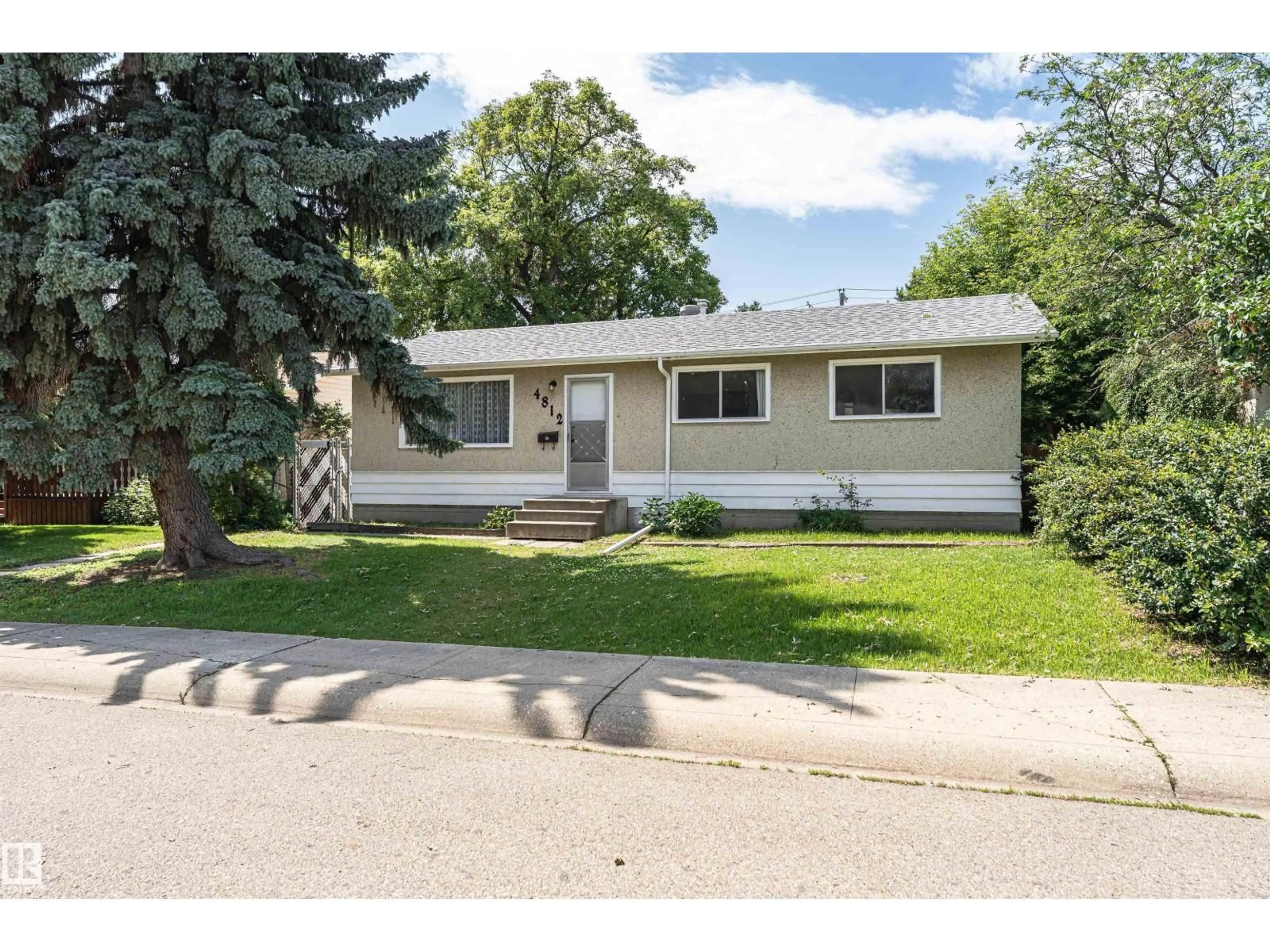 Home with vinyl exterior material, street for NW - 4812 105B ST, Edmonton Alberta T6H2S1