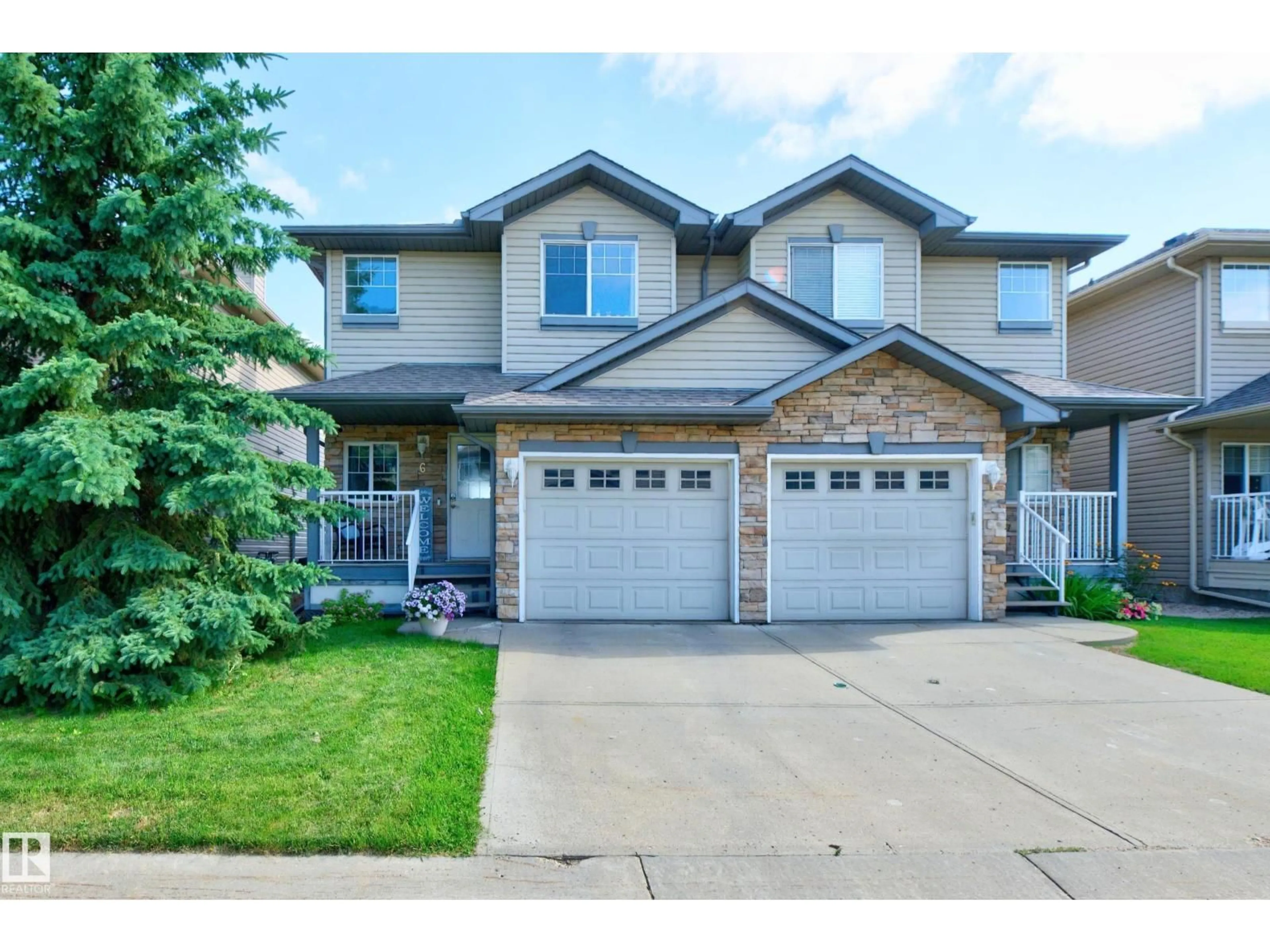 Home with vinyl exterior material, street for #6 - 12104 16 AV, Edmonton Alberta T6W1X3