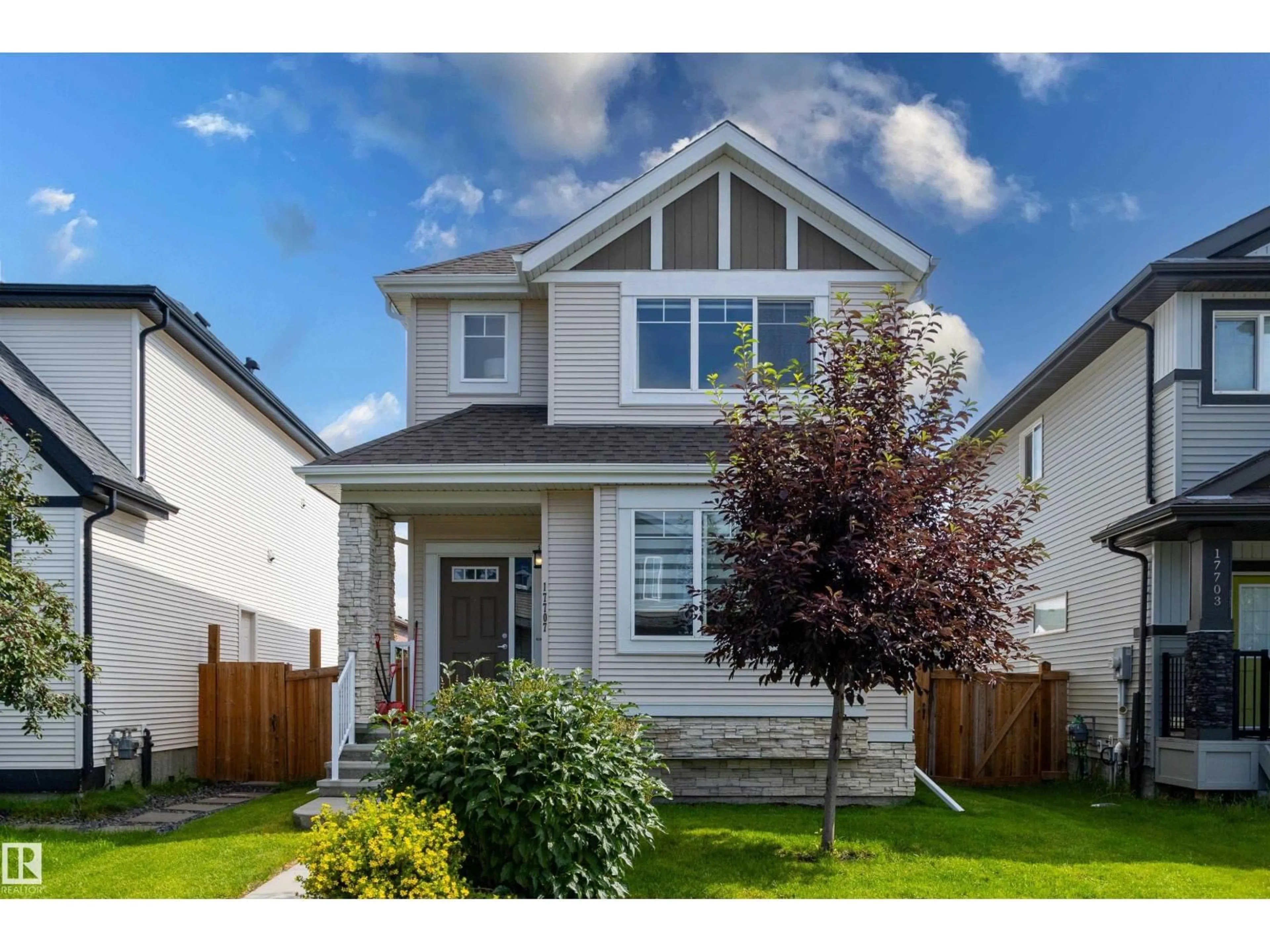 Home with vinyl exterior material, street for 17707 59 ST, Edmonton Alberta T5Y0W8