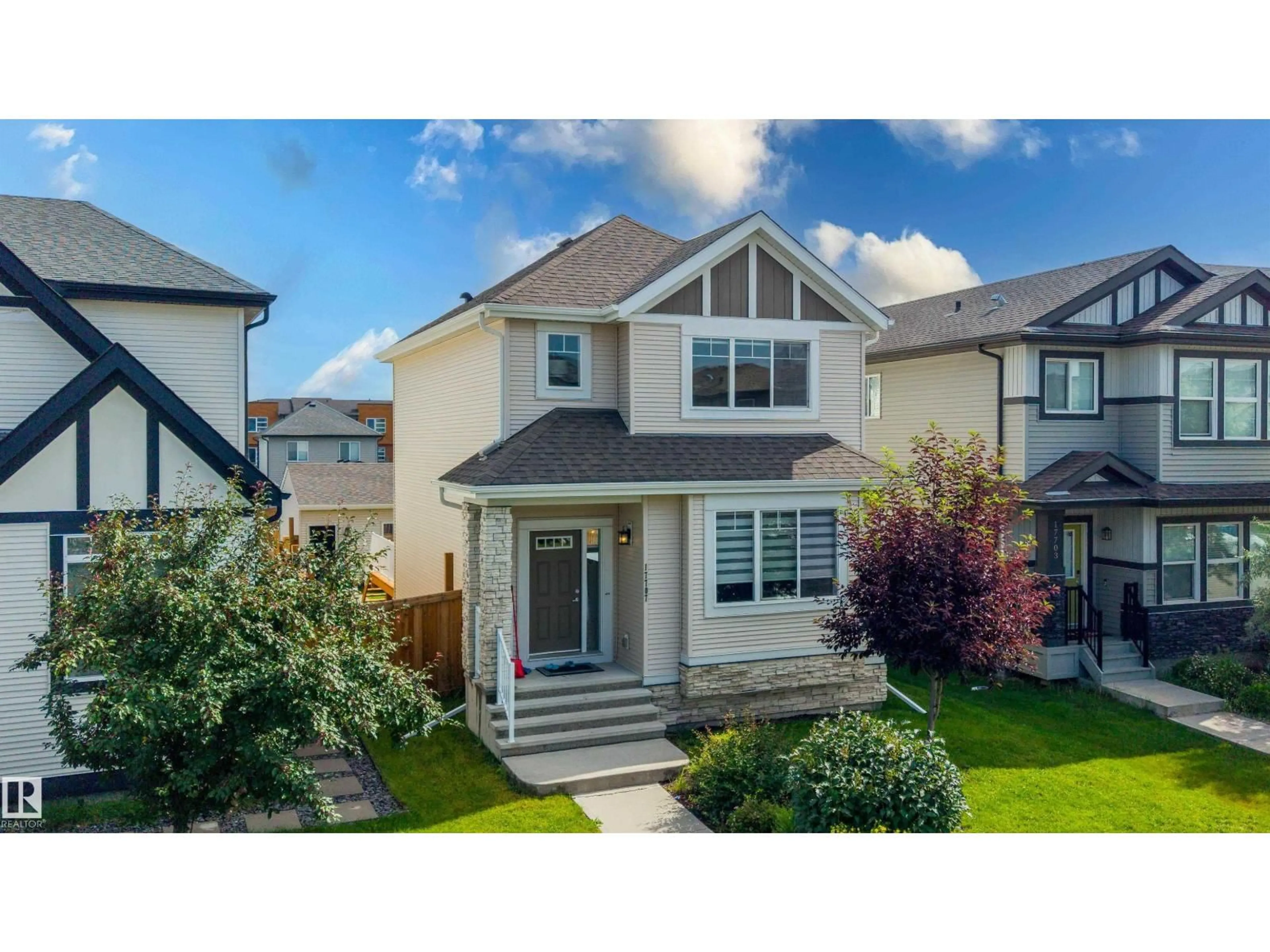 Home with vinyl exterior material, street for 17707 59 ST, Edmonton Alberta T5Y0W8