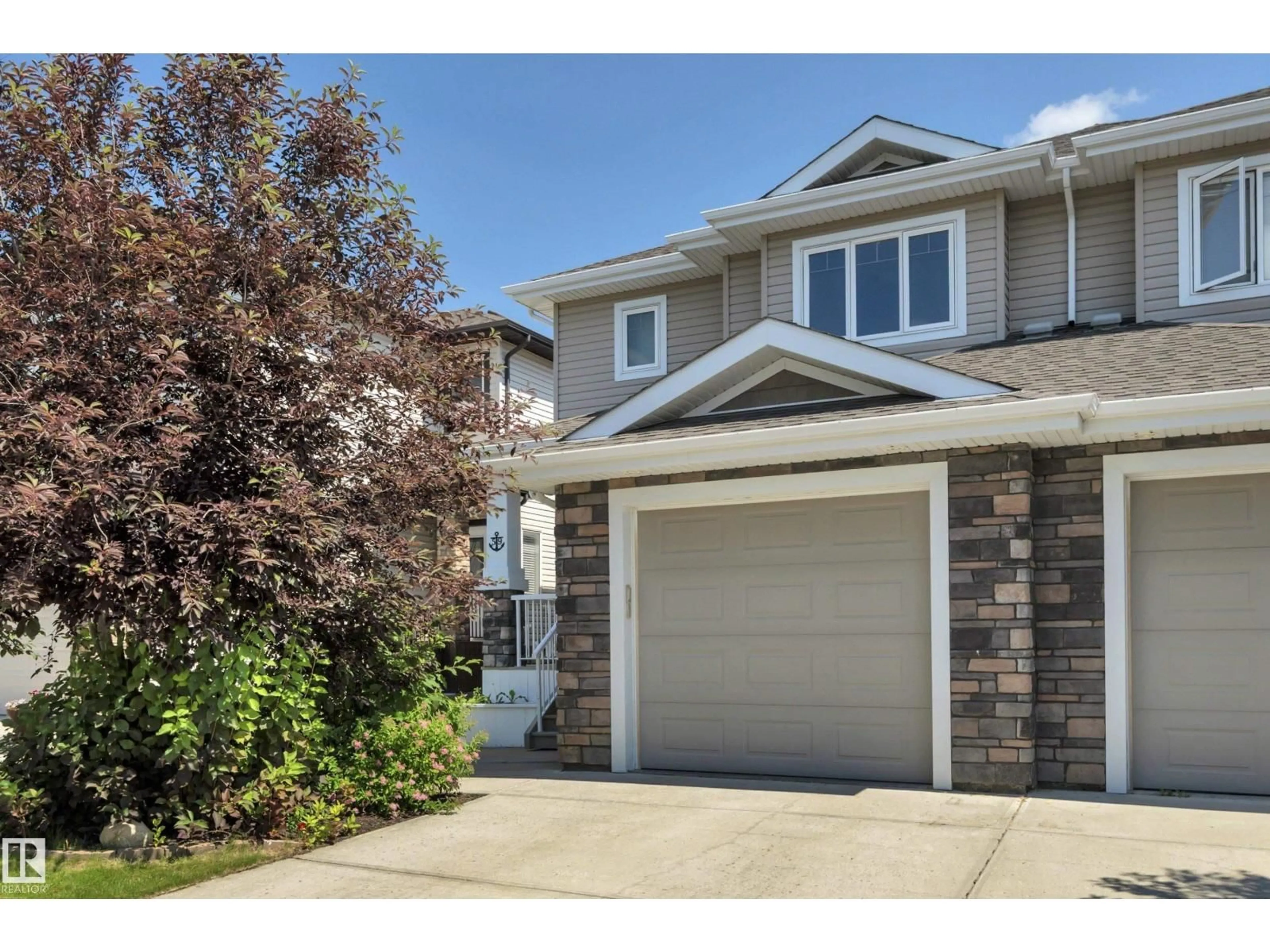 Home with vinyl exterior material, street for 59 DAVIS ST, Fort Saskatchewan Alberta T8L0N3