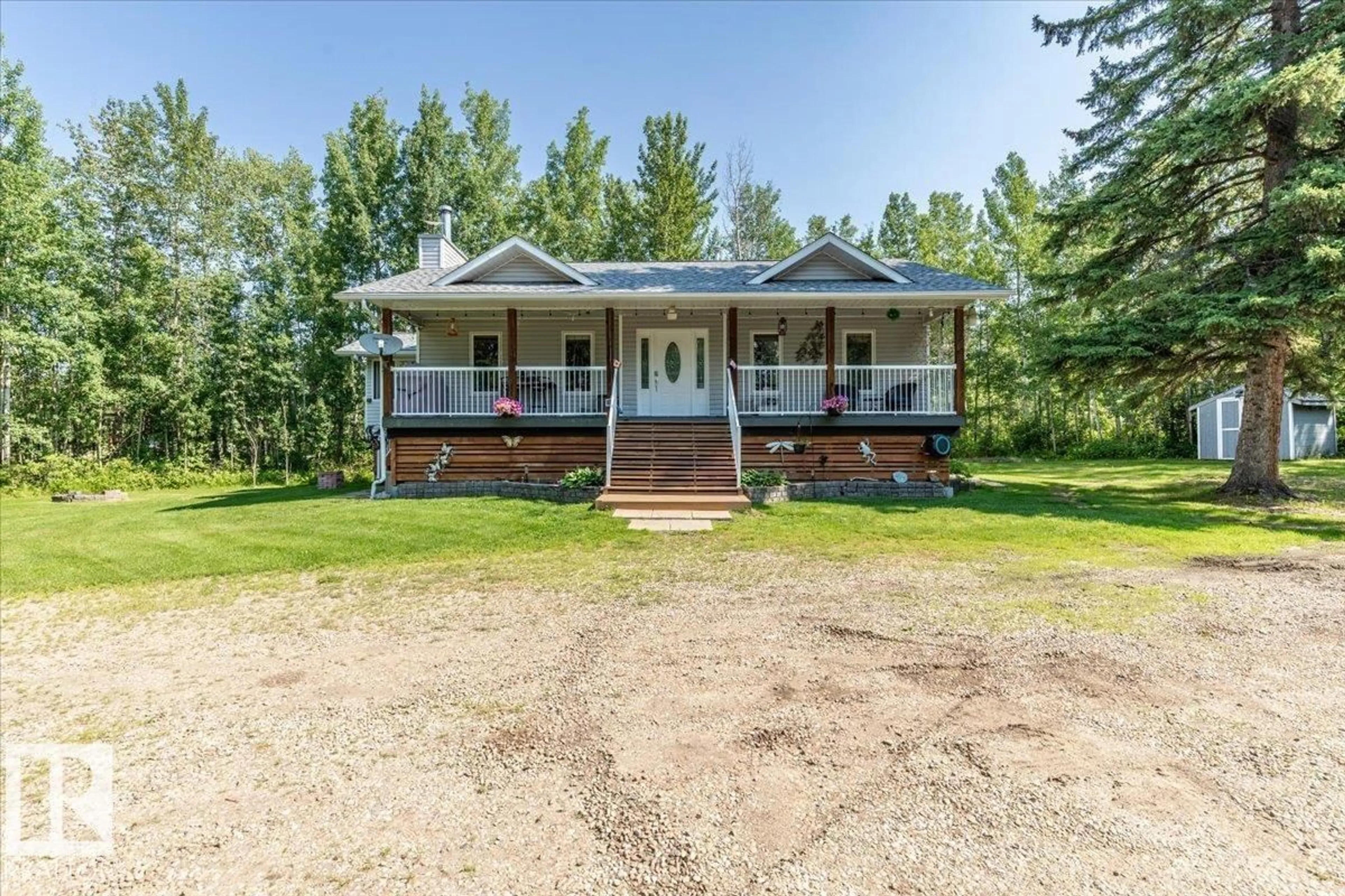 A pic from outside/outdoor area/front of a property/back of a property/a pic from drone, unknown for 5502 39 ST, Rural Wetaskiwin County Alberta T0C2C0