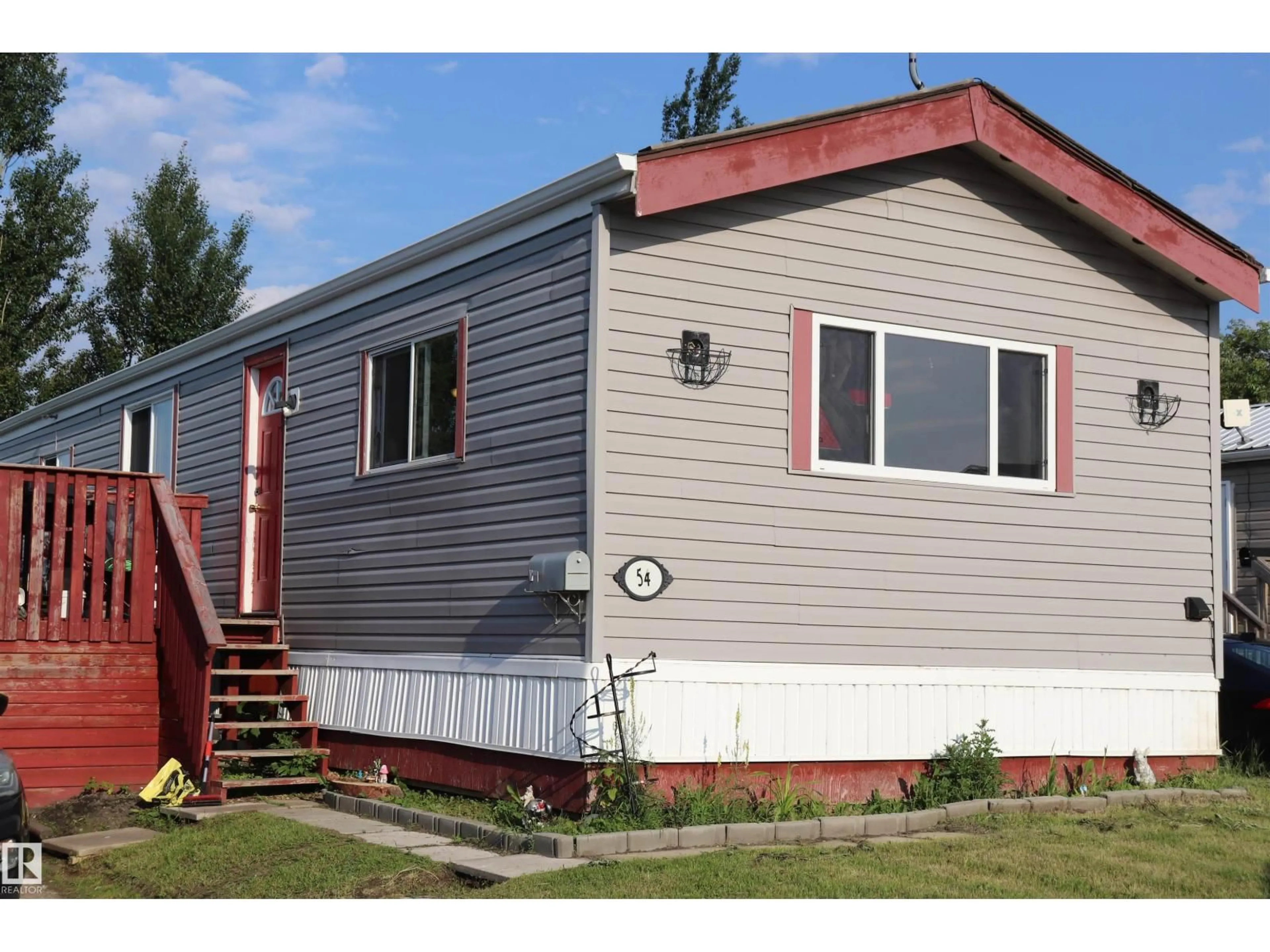 Home with vinyl exterior material, street for #54 - 4202 45 ST, Wetaskiwin Alberta T9A2L3