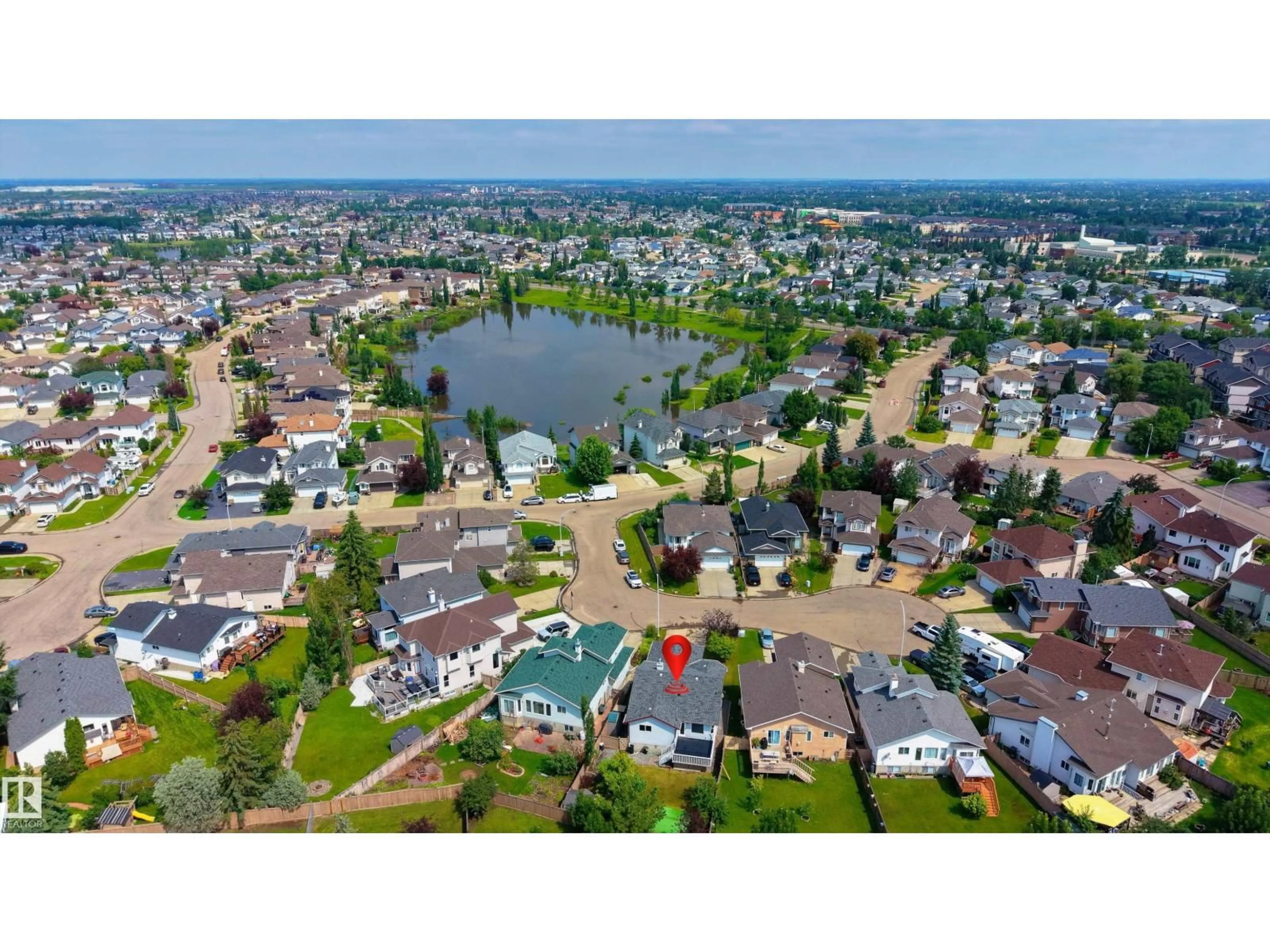 A pic from outside/outdoor area/front of a property/back of a property/a pic from drone, water/lake/river/ocean view for NW - 14120 129 ST, Edmonton Alberta T6V1K7