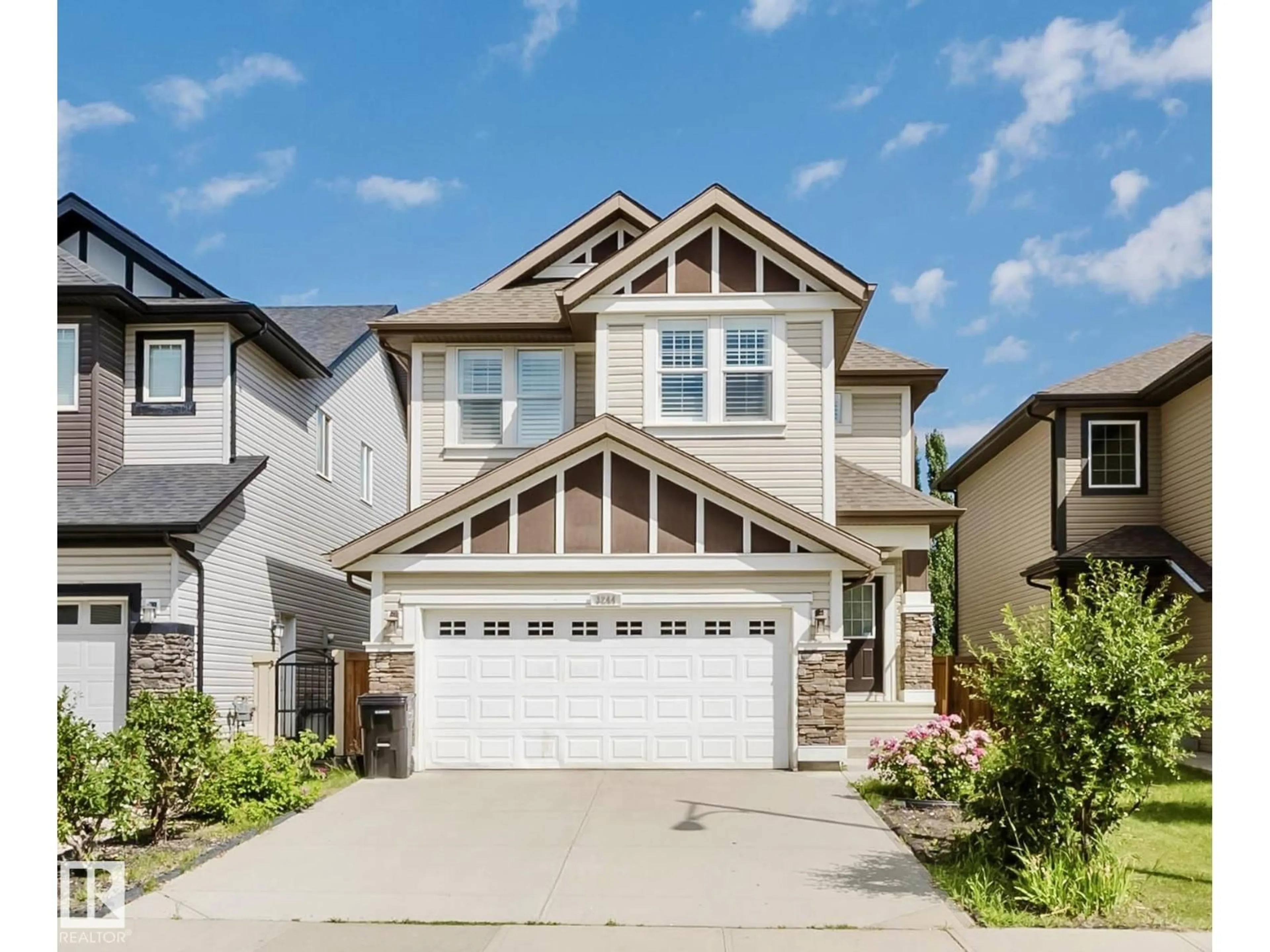 Home with vinyl exterior material, street for 3244 ABBOTT CR, Edmonton Alberta T6W2M4