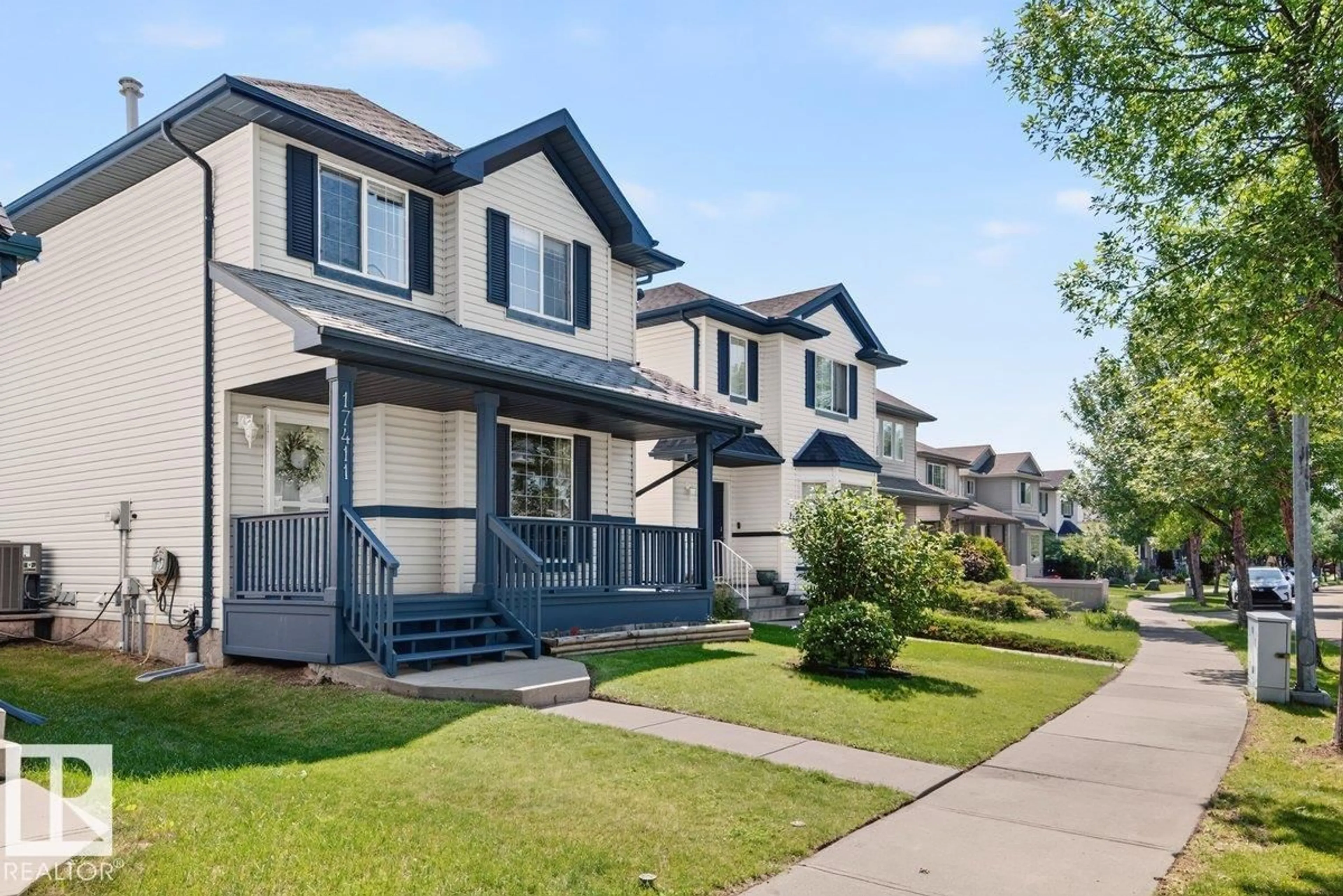 Home with vinyl exterior material, street for NW - 17411 90 ST, Edmonton Alberta T5Z3X8