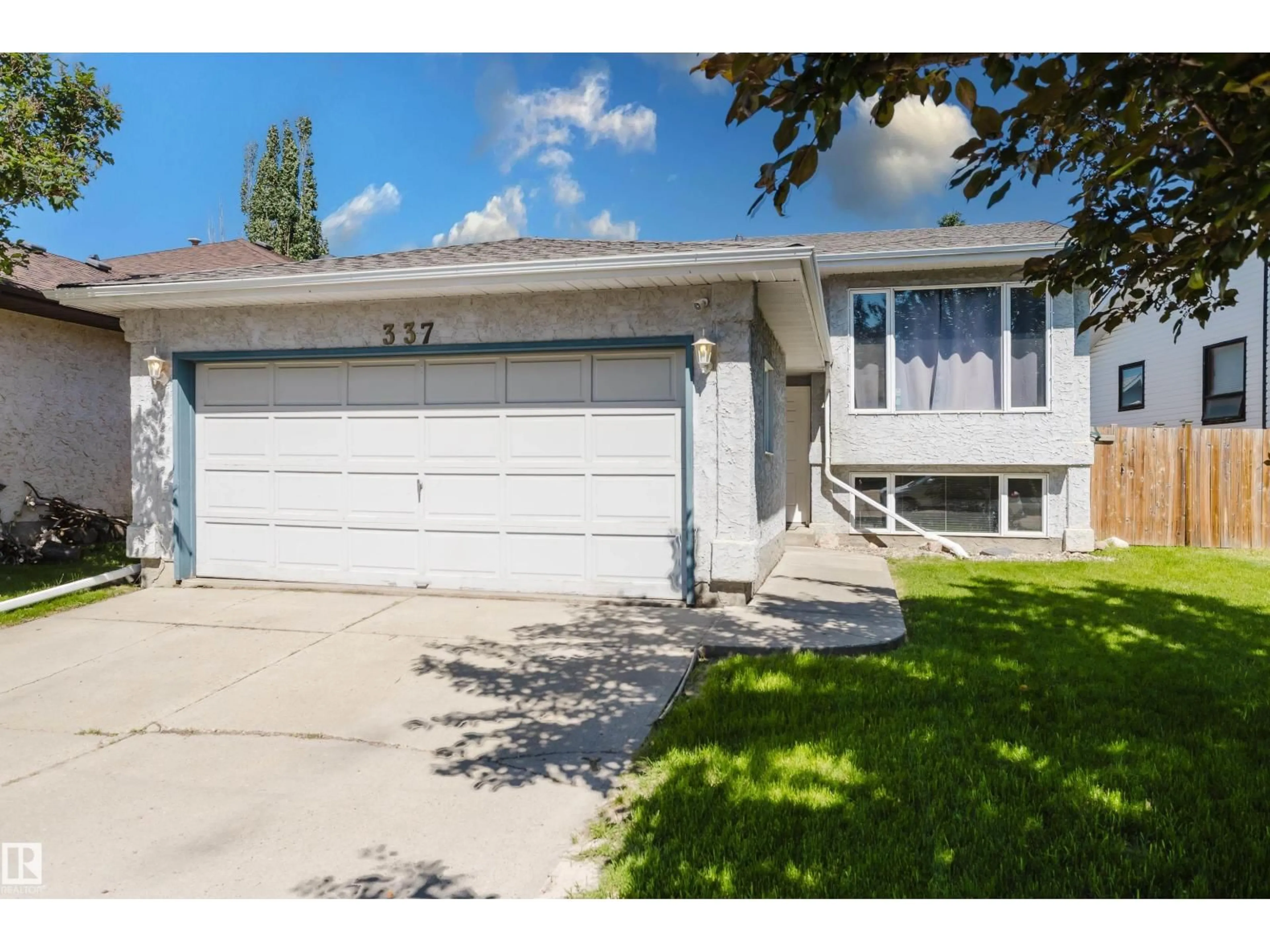 Home with vinyl exterior material, street for NW - 337 PEARSON CR, Edmonton Alberta T5T5Y7