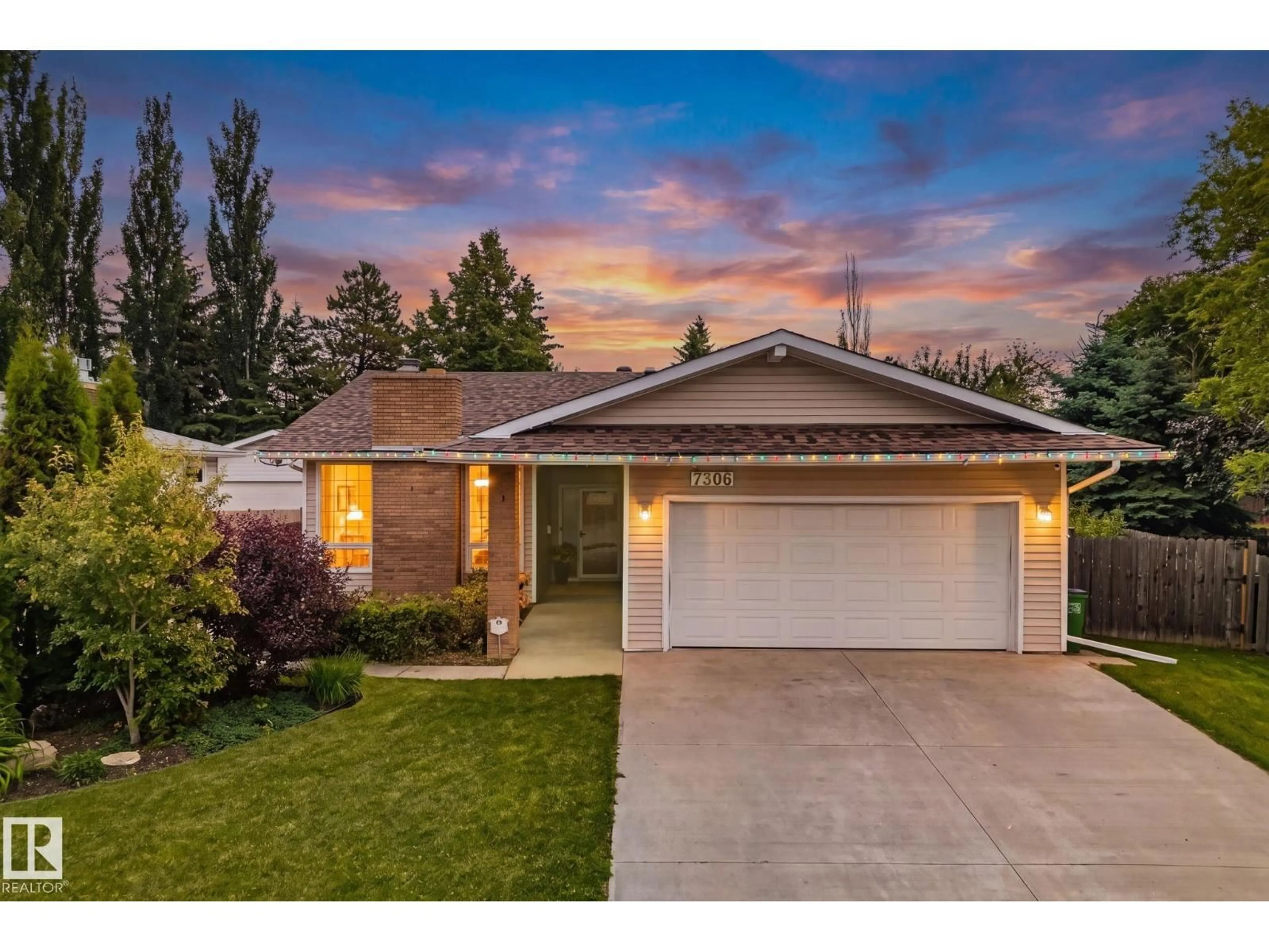 Home with vinyl exterior material, street for NW - 7306 21 AV, Edmonton Alberta T6K2C4