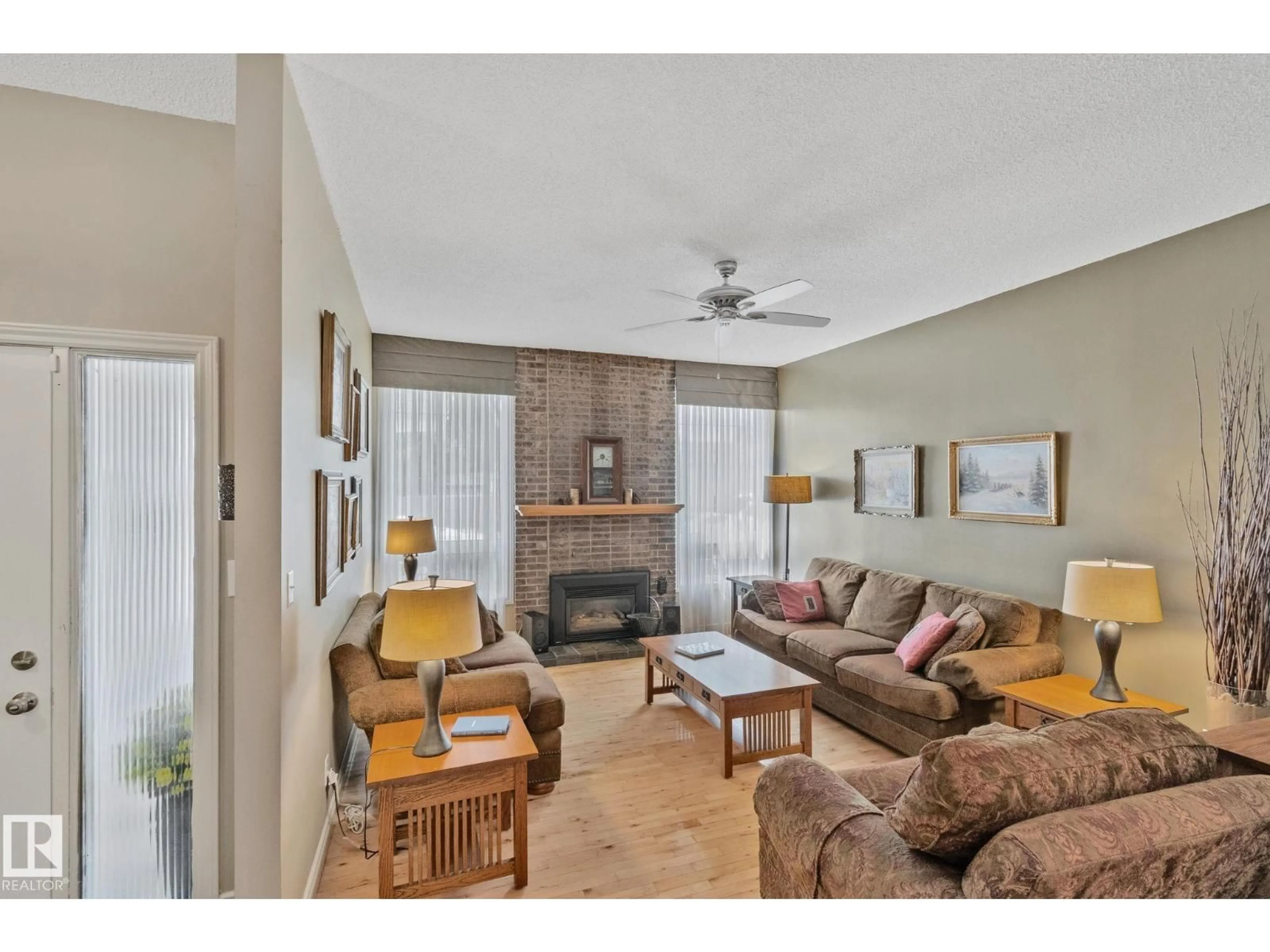 Living room with furniture, unknown for NW - 7306 21 AV, Edmonton Alberta T6K2C4