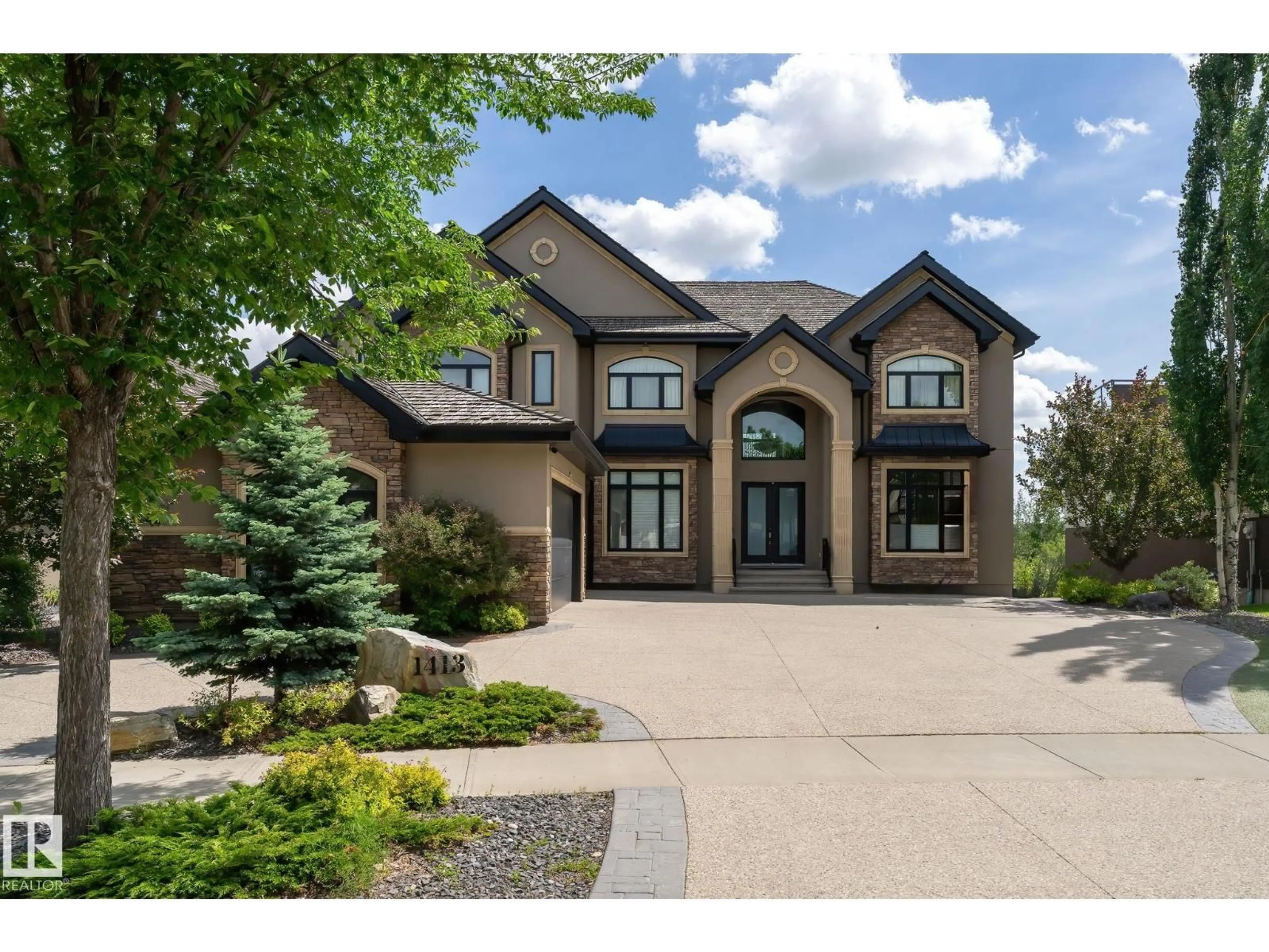 Home with brick exterior material, street for 1413 WOODWARD CR, Edmonton Alberta T6M0A3