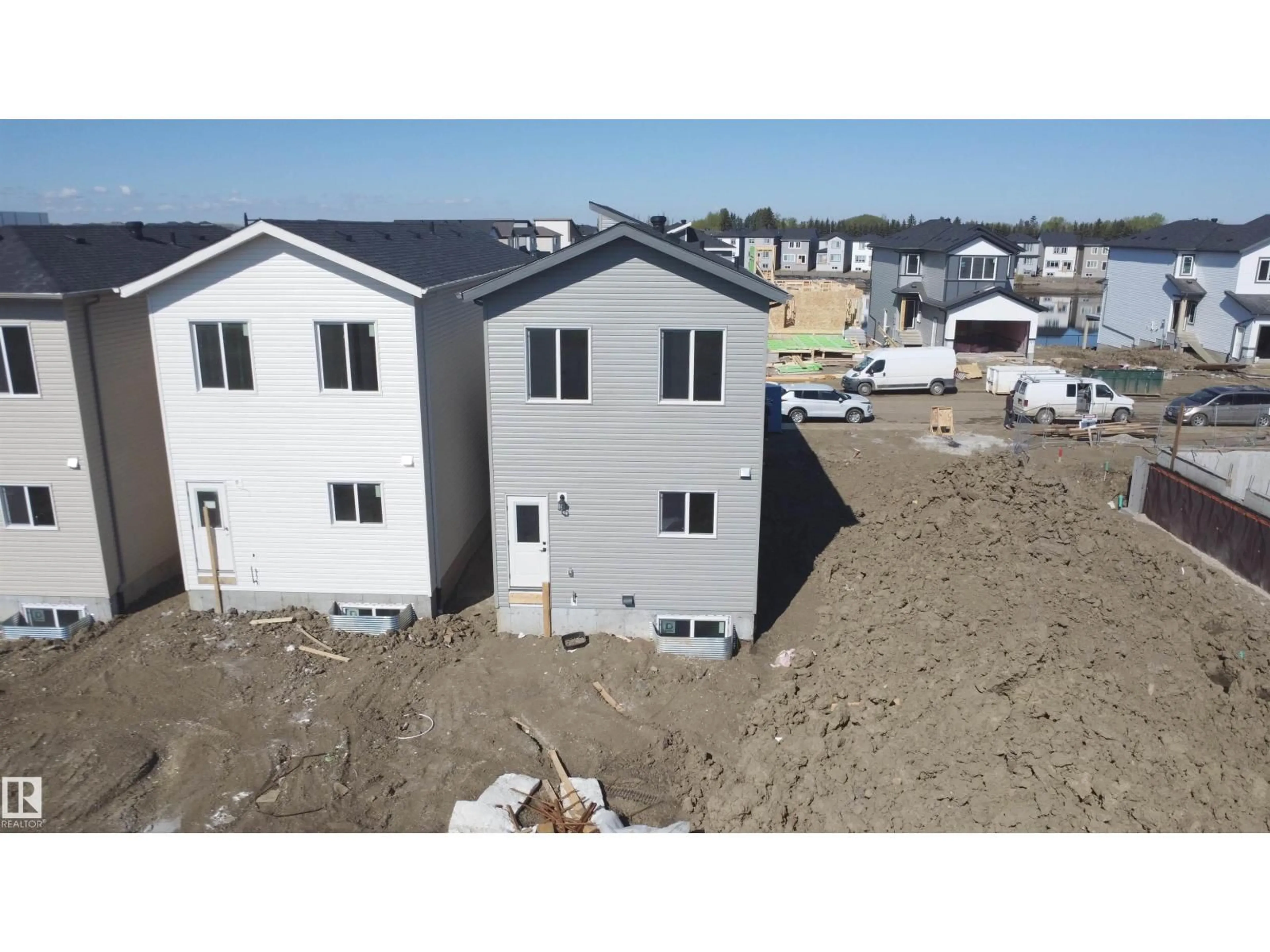 A pic from outside/outdoor area/front of a property/back of a property/a pic from drone, building for 4215 63 STREET, Beaumont Alberta T4X3E9