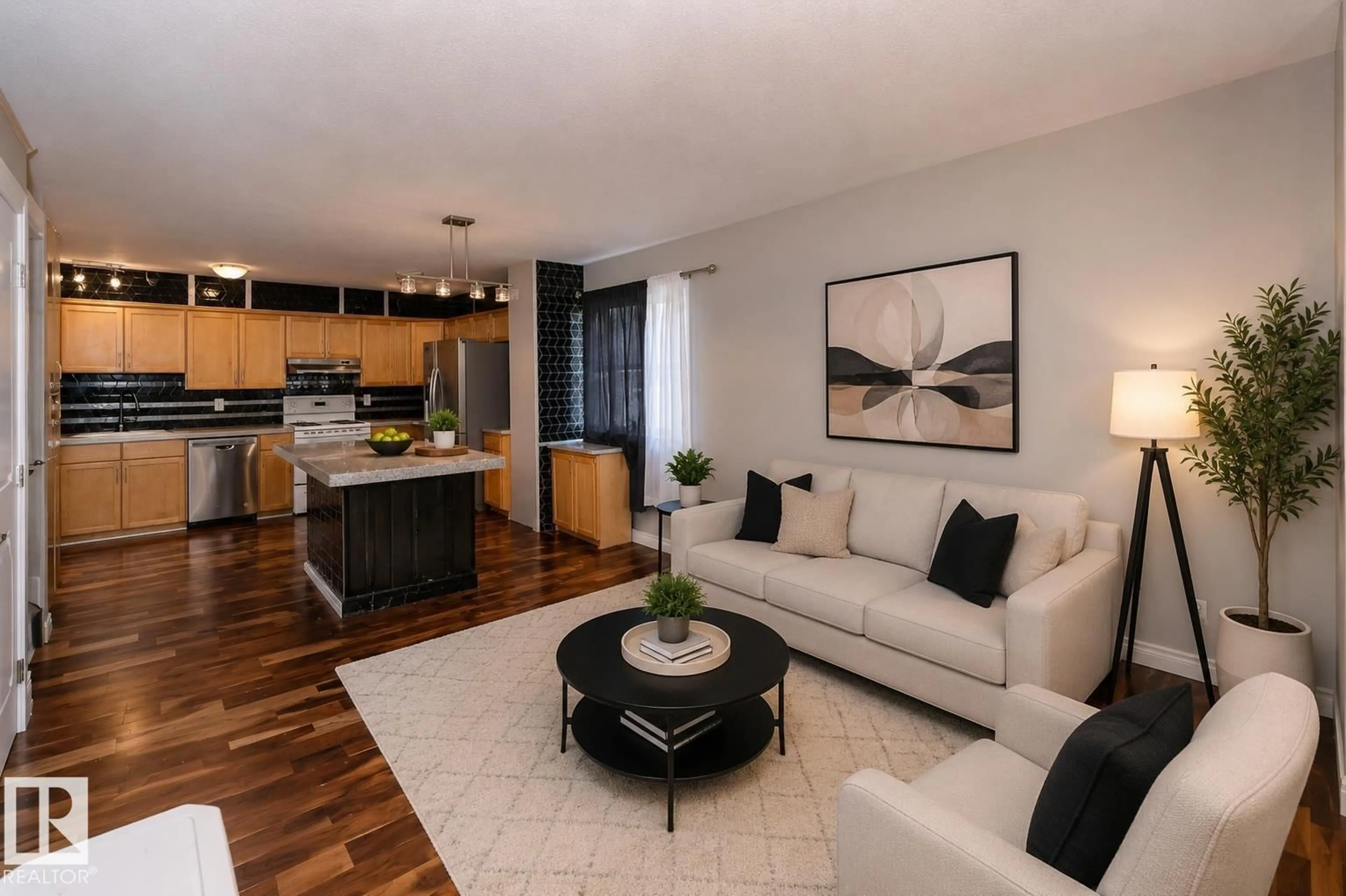 Living room with furniture, wood/laminate floor for NW - 11915 77 ST, Edmonton Alberta T5B2G5