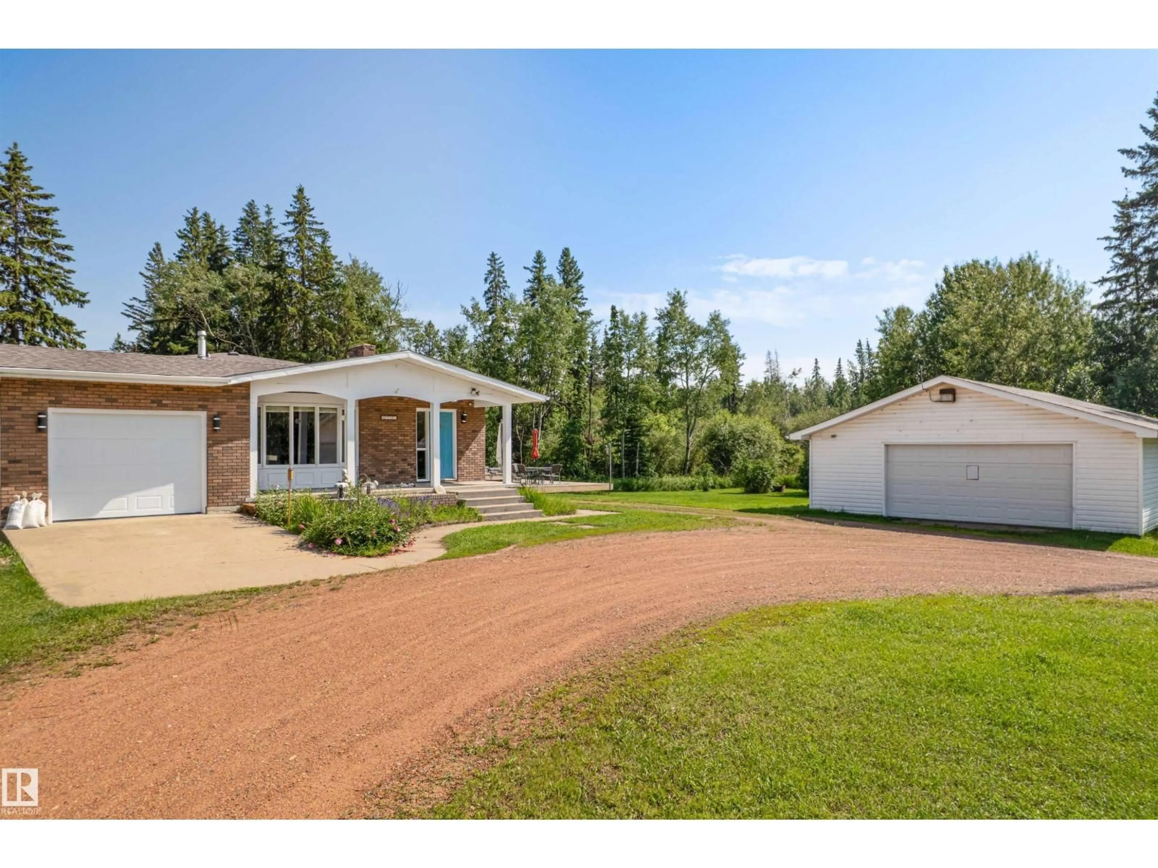 A pic from outside/outdoor area/front of a property/back of a property/a pic from drone, unknown for 57108 - 38 RGE ROAD 220 RGE ROAD, Rural Sturgeon County Alberta T0A2W0