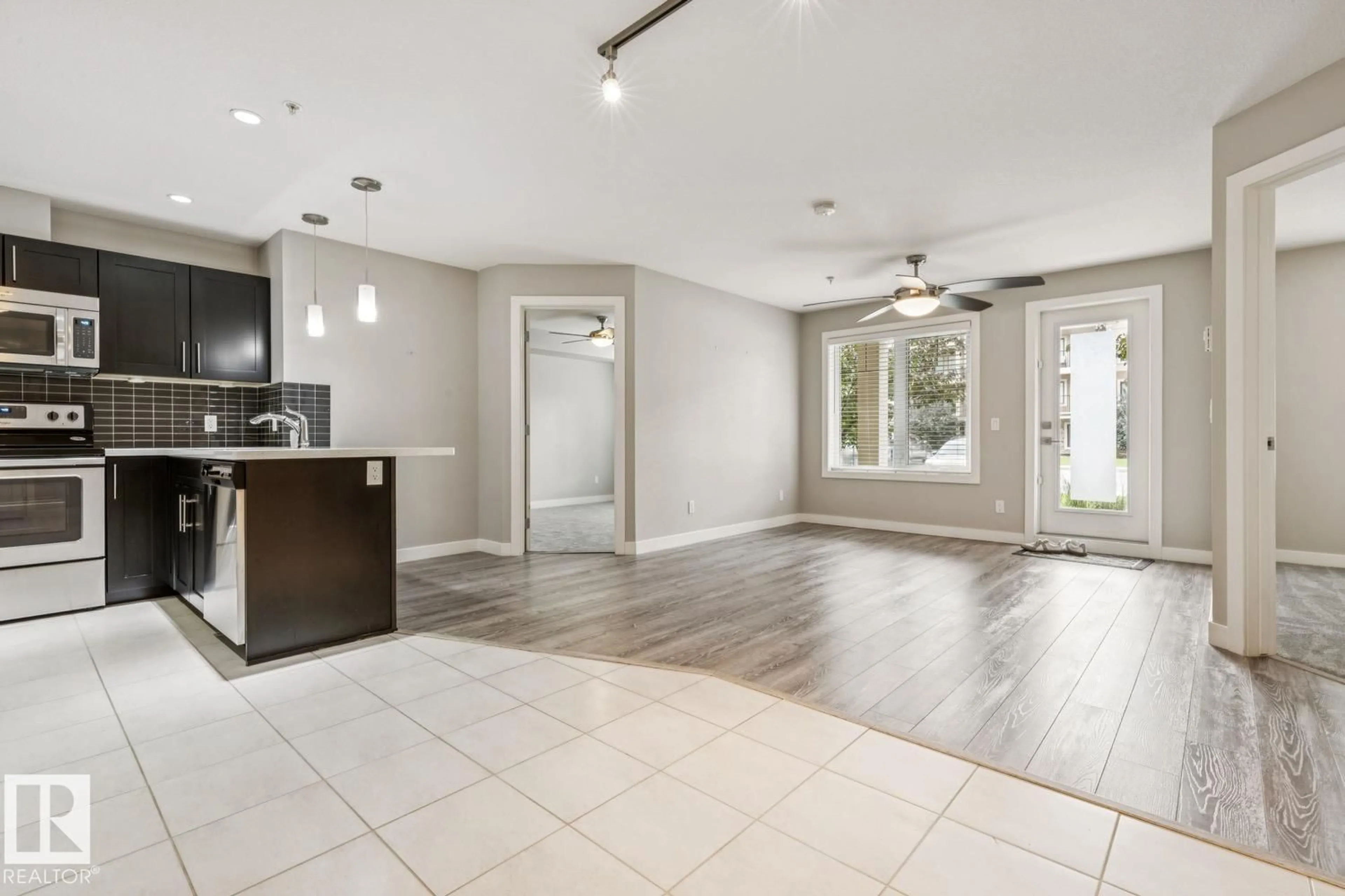 Open concept kitchen, ceramic/tile floor for #118 - 1031 173 ST, Edmonton Alberta T6W3E4