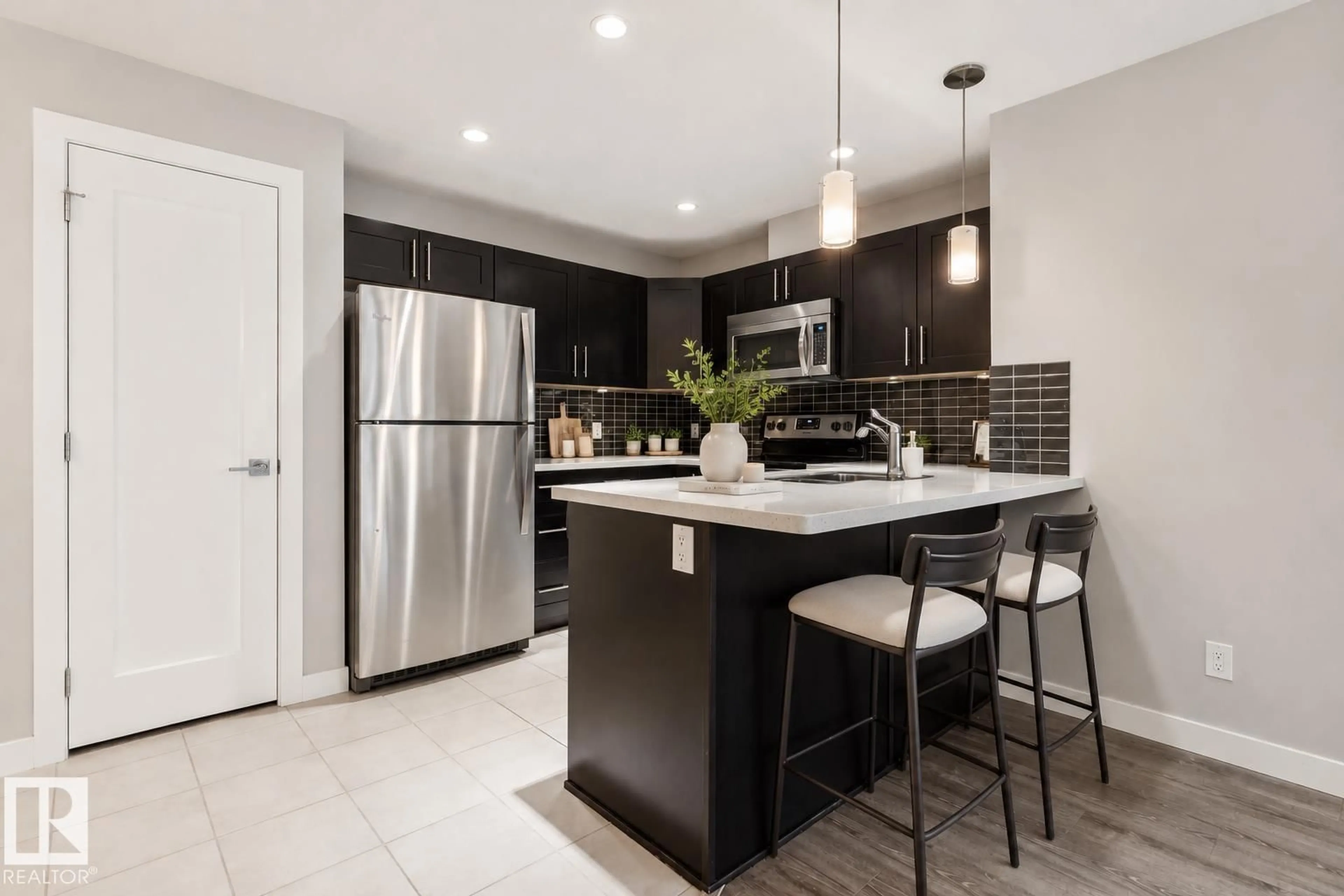 Open concept kitchen, ceramic/tile floor for #118 - 1031 173 ST, Edmonton Alberta T6W3E4