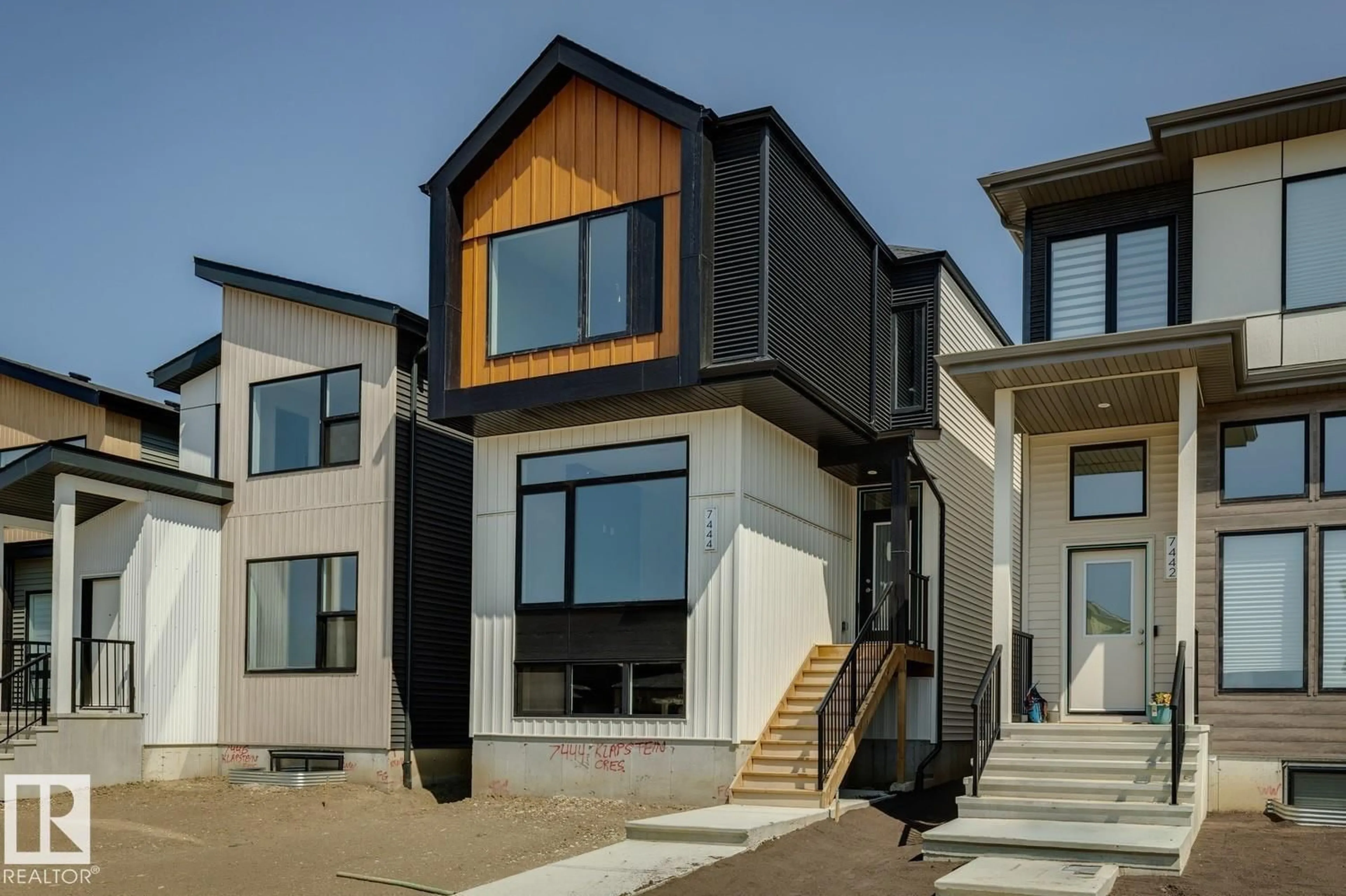 Home with vinyl exterior material, street for 7444 KLAPSTEIN CR, Edmonton Alberta T6W5N7