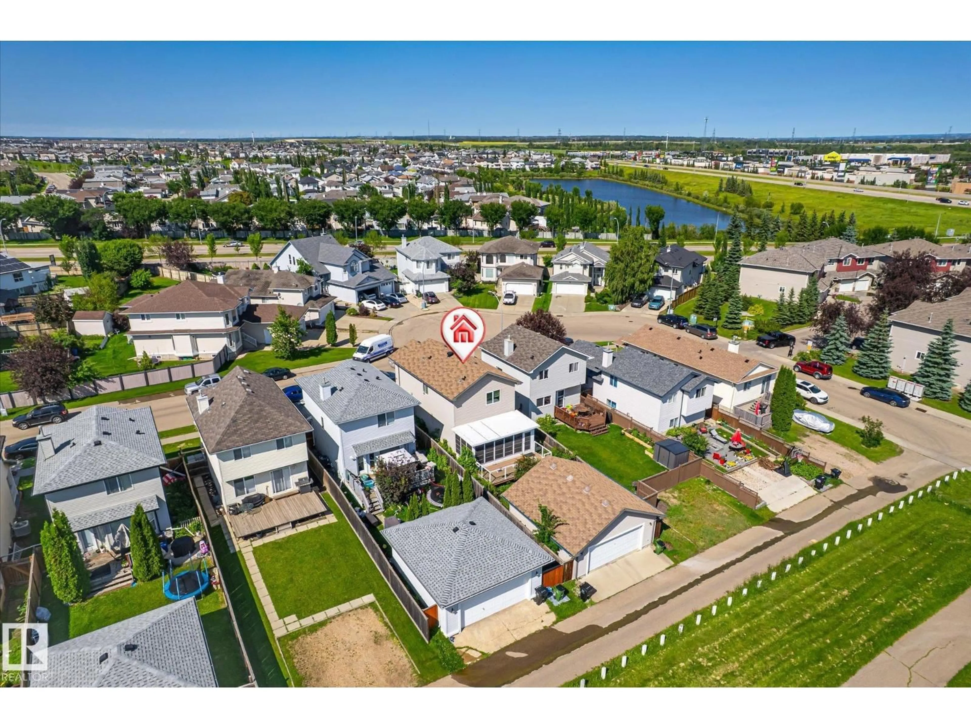 A pic from outside/outdoor area/front of a property/back of a property/a pic from drone, water/lake/river/ocean view for 4317 152 AV, Edmonton Alberta T5Y3C4
