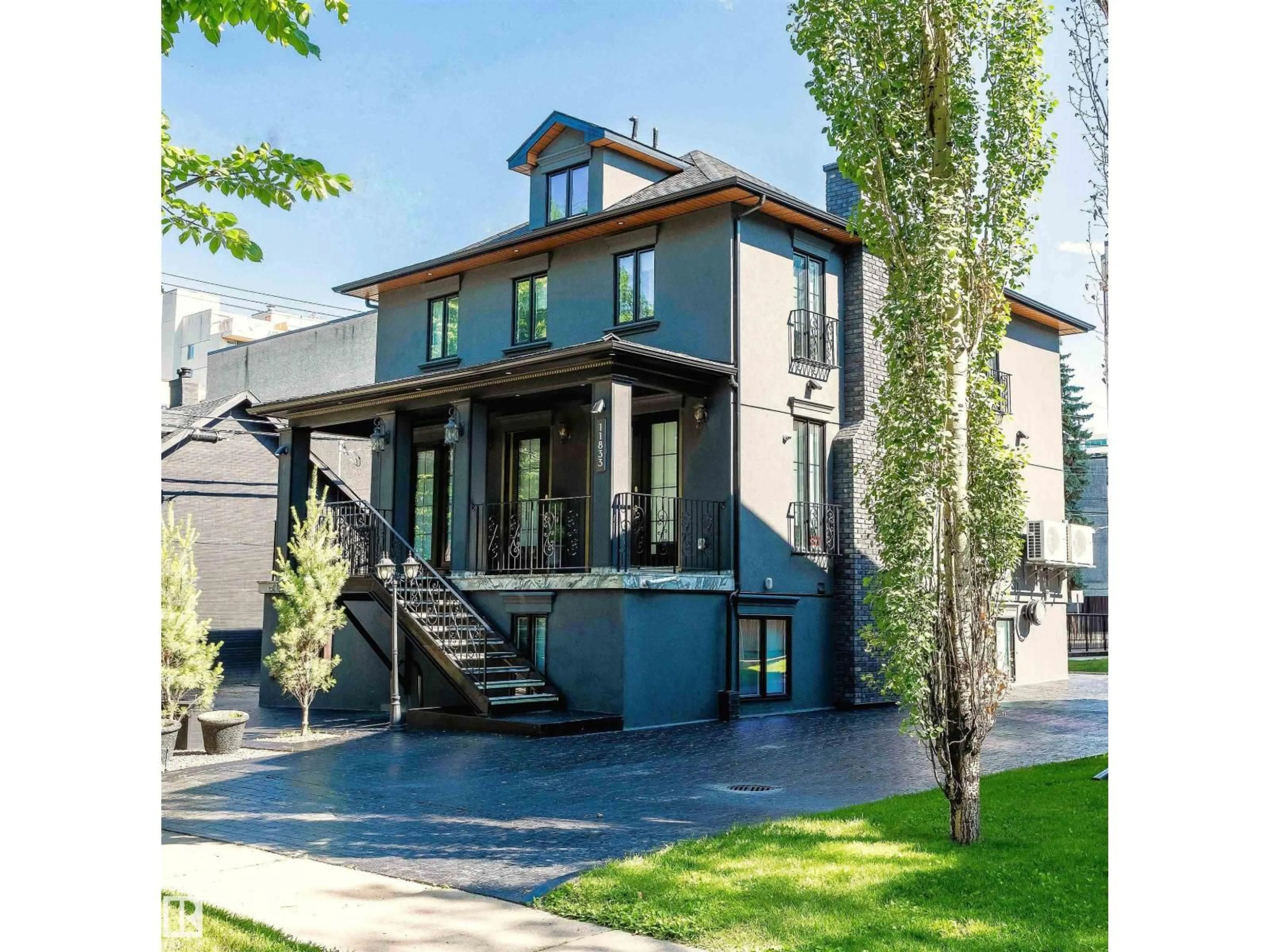 Home with brick exterior material, street for 11833 102 AV, Edmonton Alberta T5K0R6