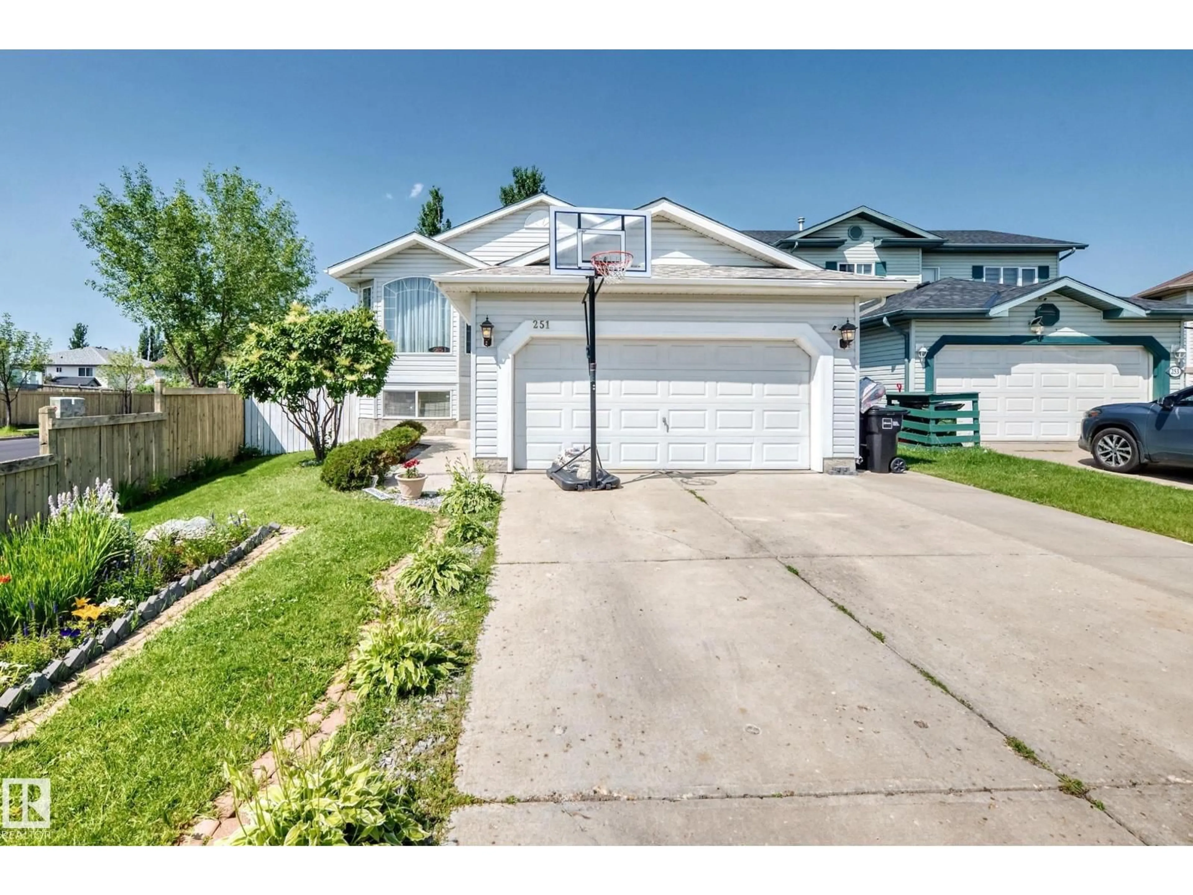 Home with vinyl exterior material, street for 251 DUNVEGAN RD, Edmonton Alberta T5T5E5