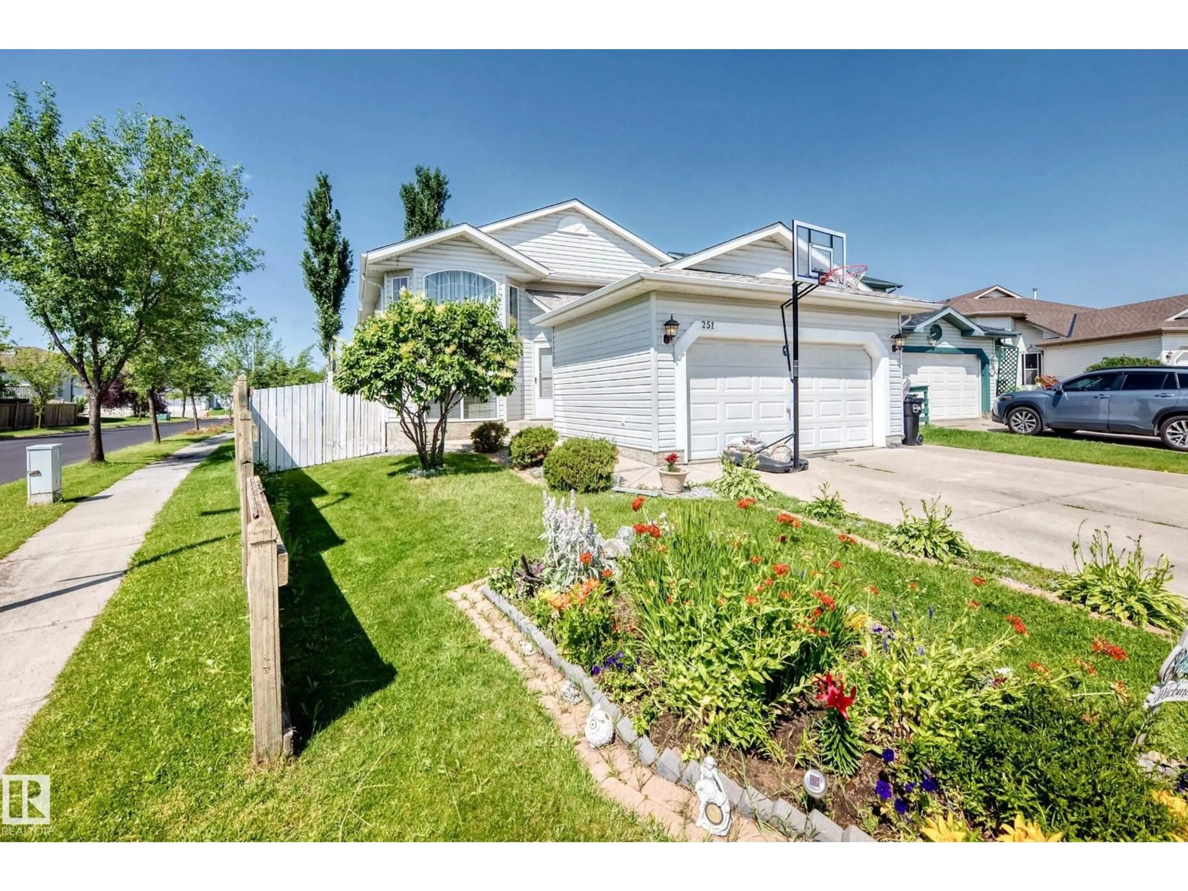 Home with vinyl exterior material, street for 251 DUNVEGAN RD, Edmonton Alberta T5T5E5