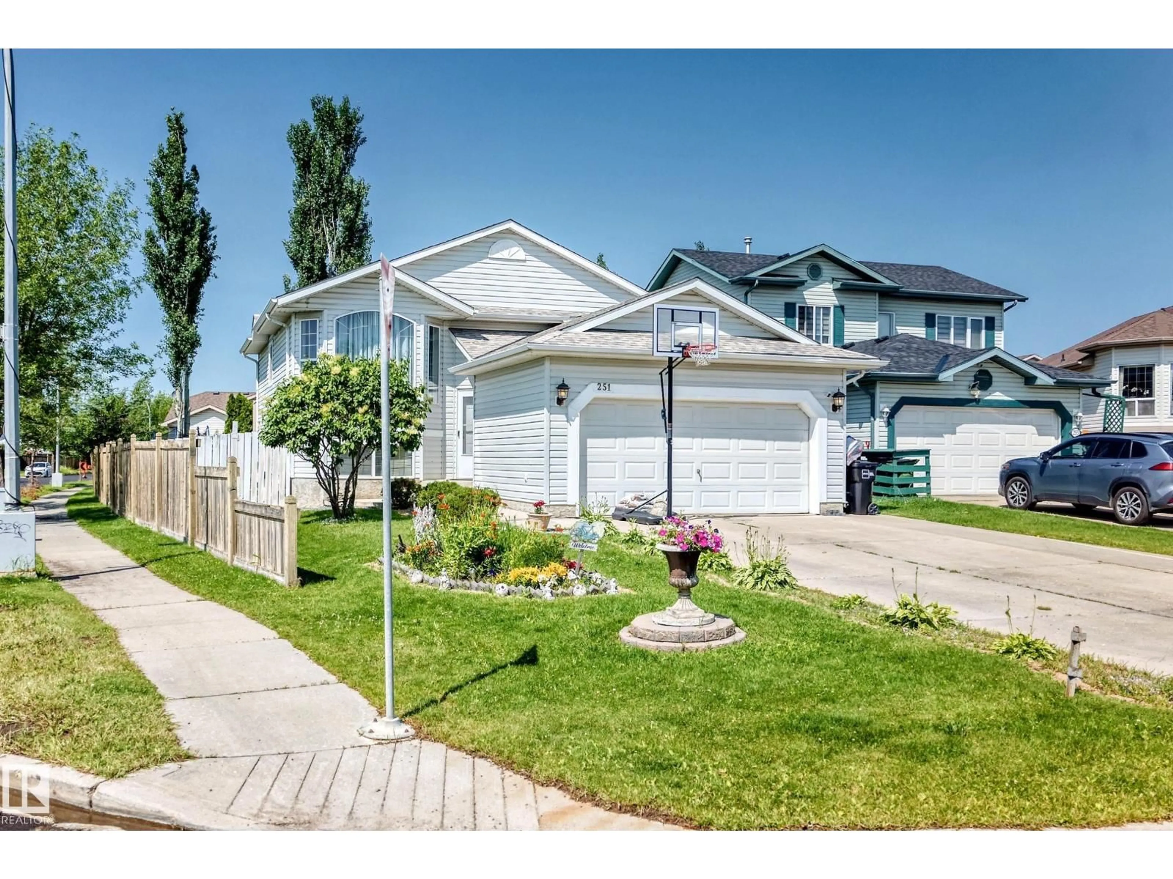 Home with vinyl exterior material, street for 251 DUNVEGAN RD, Edmonton Alberta T5T5E5