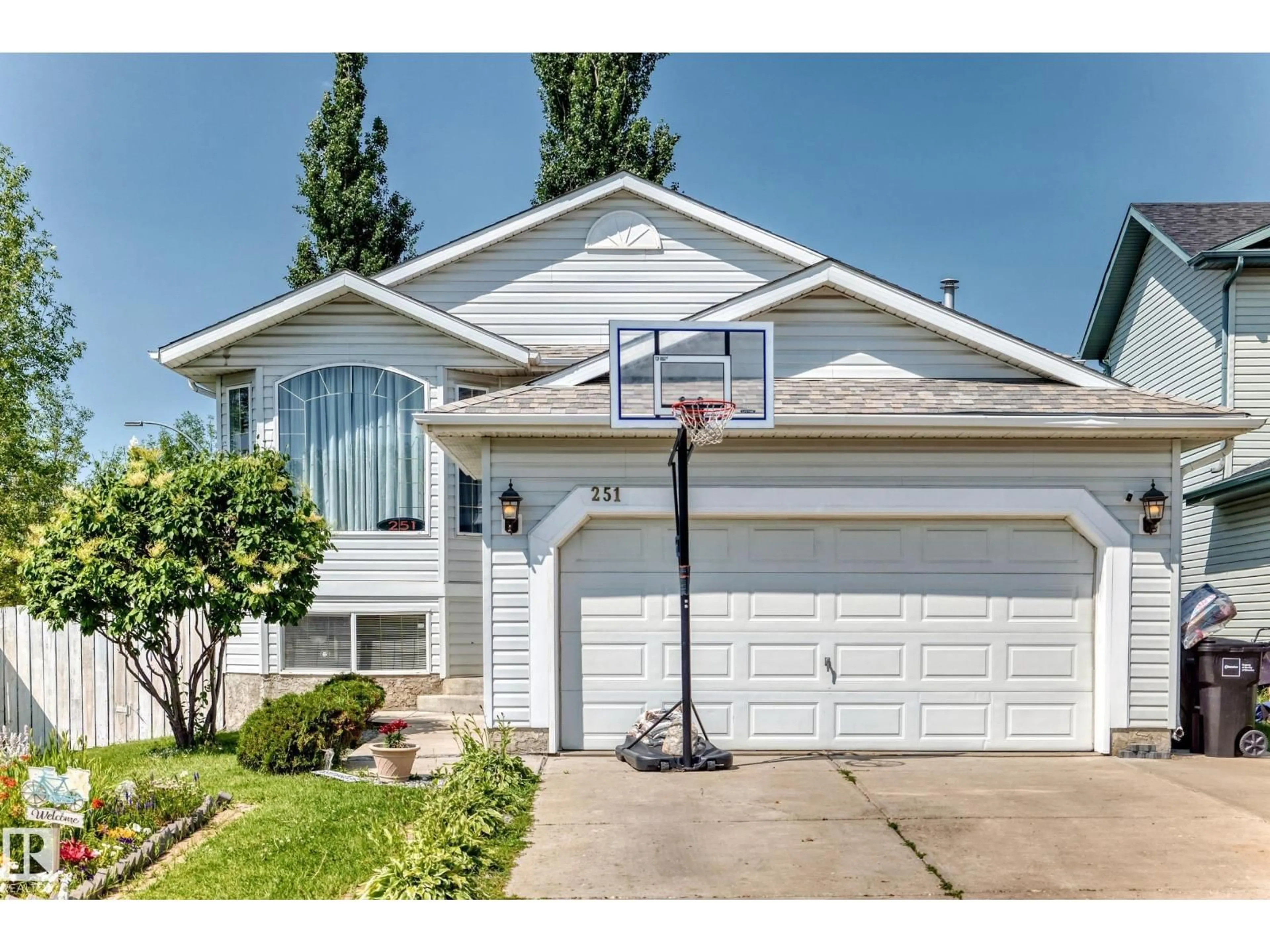 Home with vinyl exterior material, street for 251 DUNVEGAN RD, Edmonton Alberta T5T5E5