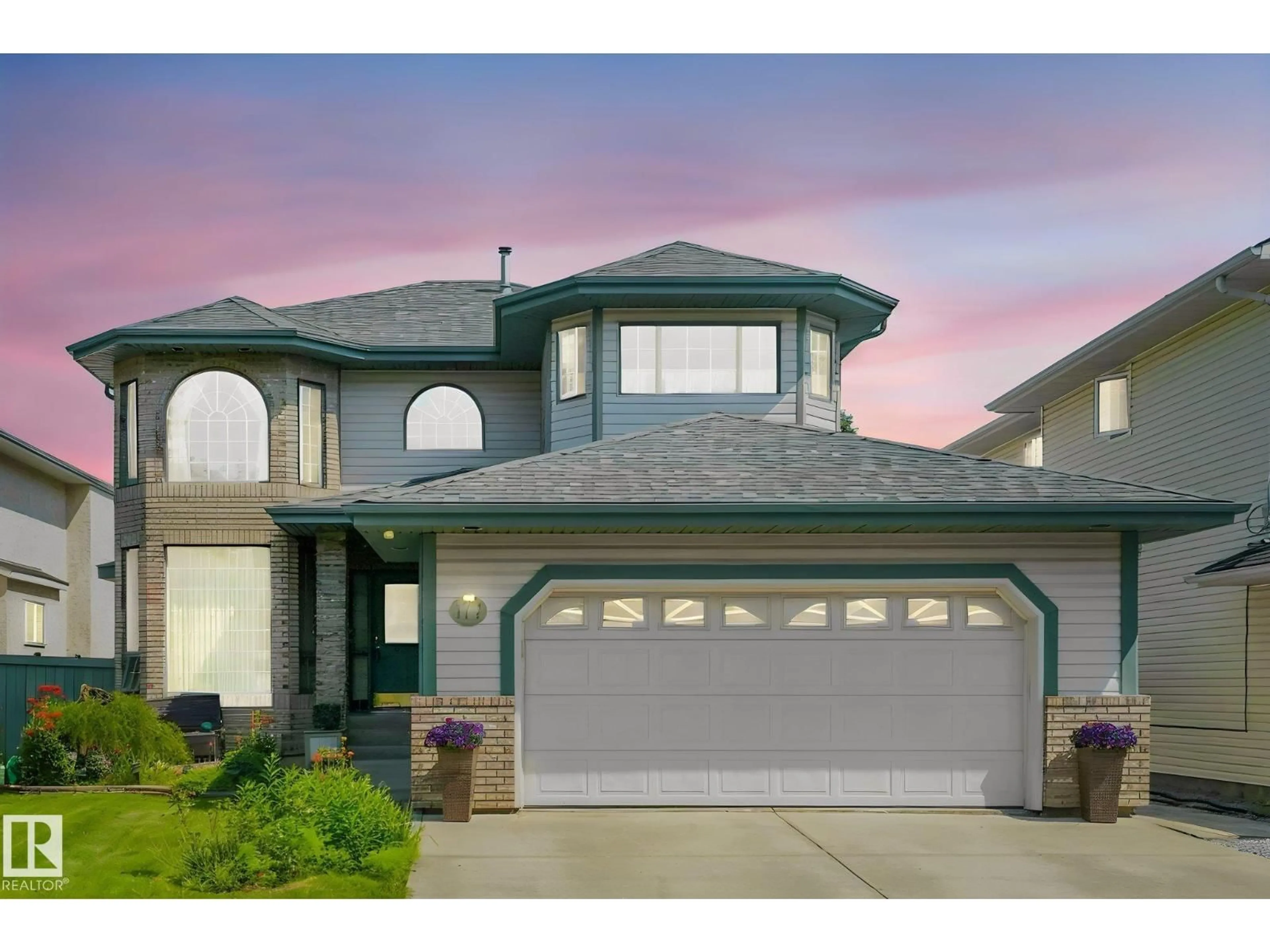 Home with vinyl exterior material, street for 177 KULAWY DR, Edmonton Alberta T6L6Z1