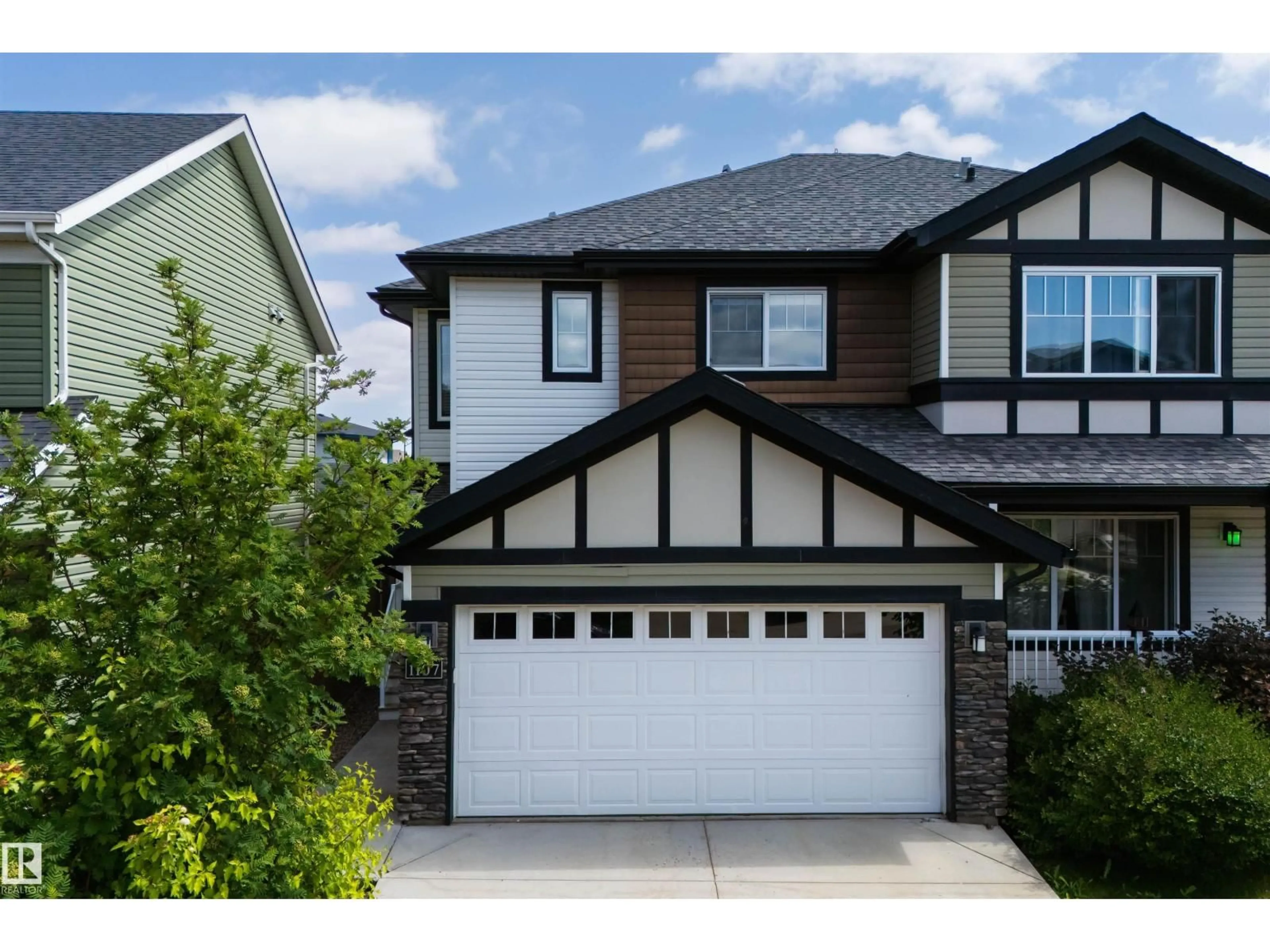 Home with vinyl exterior material, street for SW - 1107 162 ST, Edmonton Alberta T6W2L1