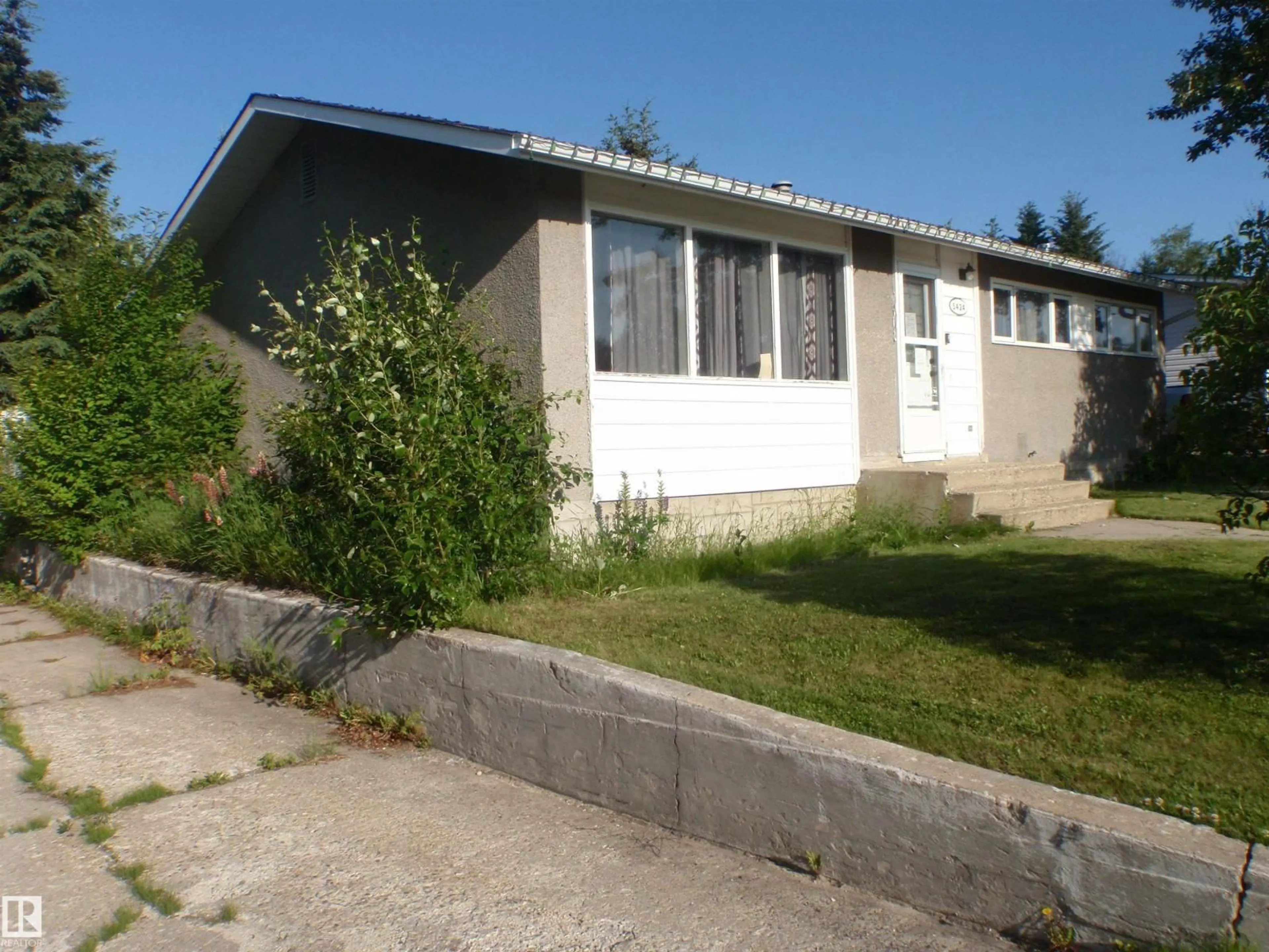 Home with vinyl exterior material, street for 5424 WILLOCK CR, Swan Hills Alberta T0G2C0