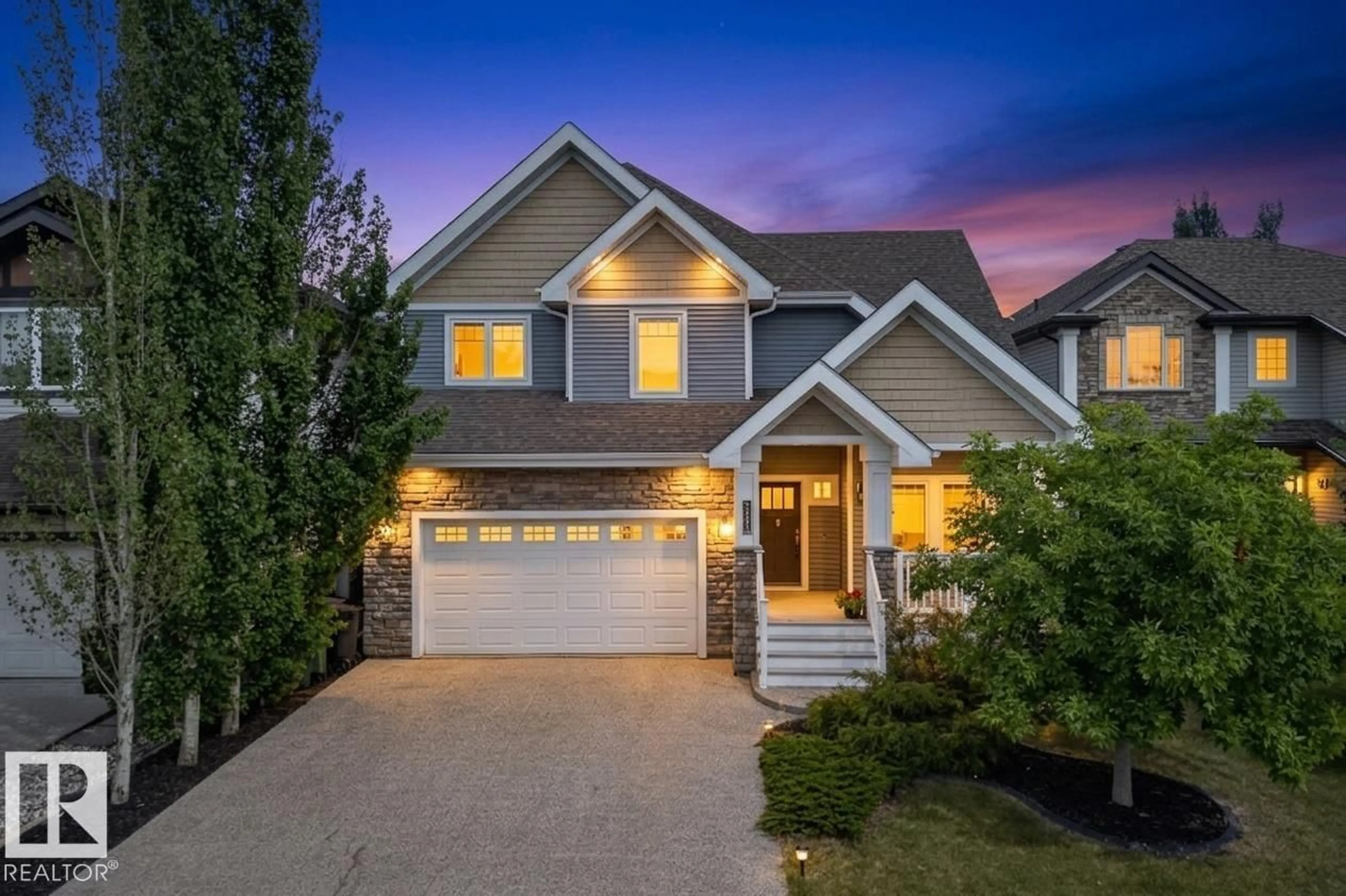 Home with vinyl exterior material, street for 6311 MANN PL, Edmonton Alberta T6R0J2