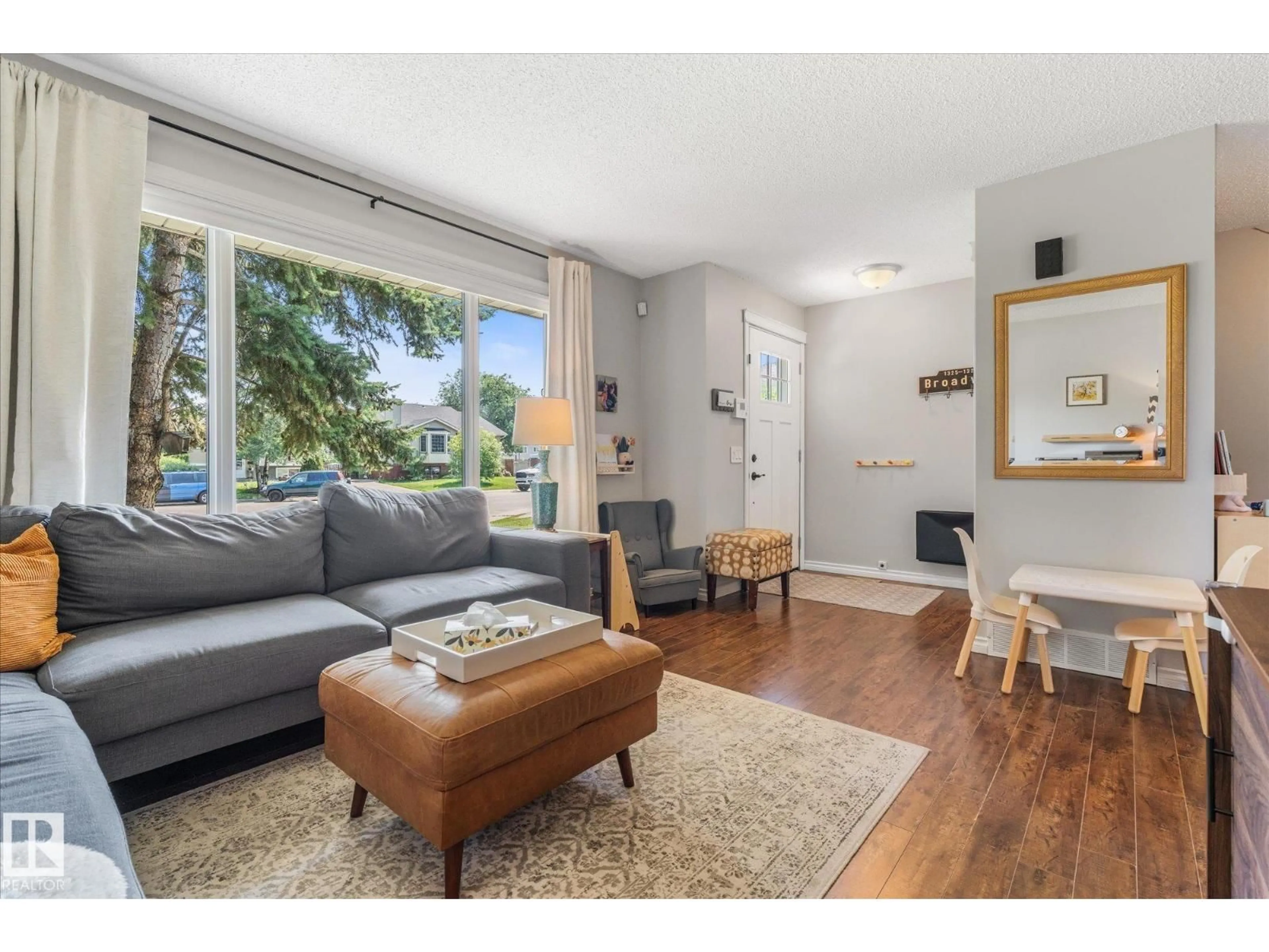 Living room with furniture, unknown for 4718 35 AV, Edmonton Alberta T6L3P9