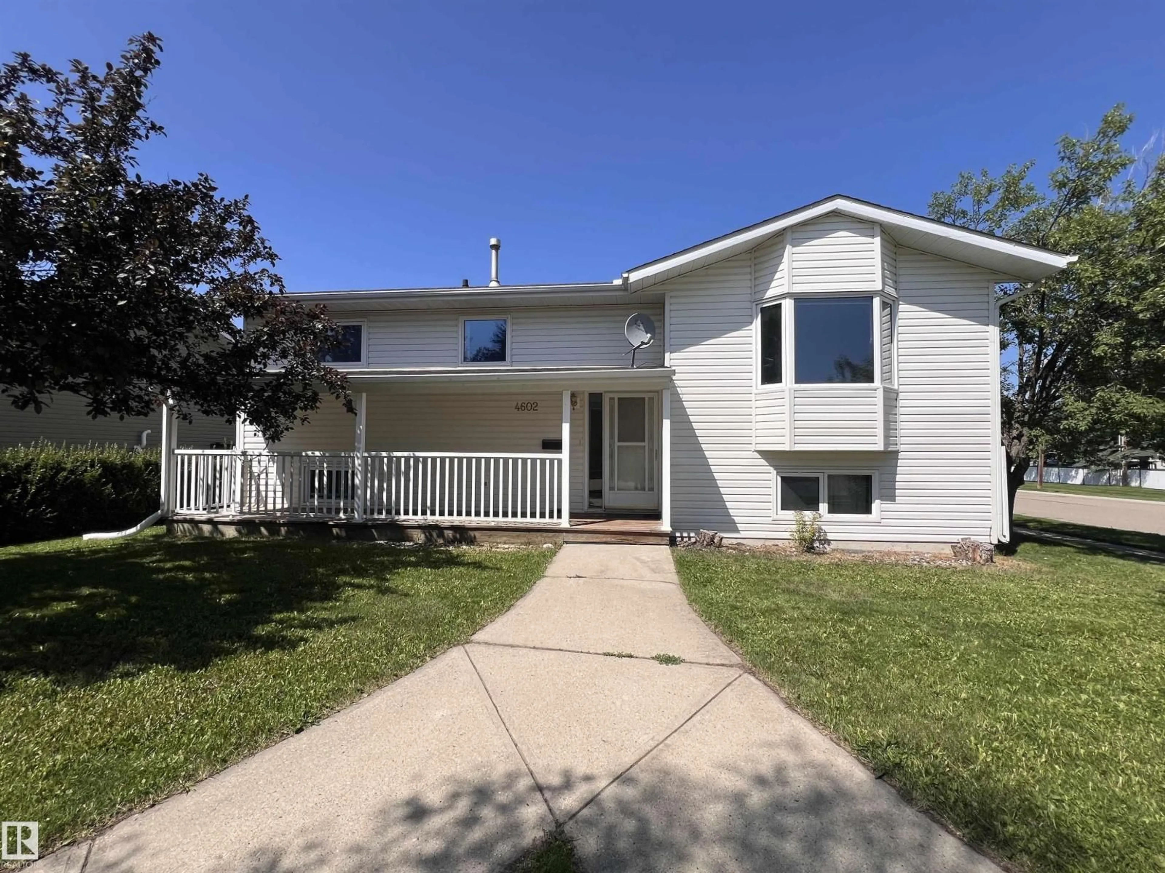Home with vinyl exterior material, street for 4602 52 AV, Bentley Alberta T0C0J0