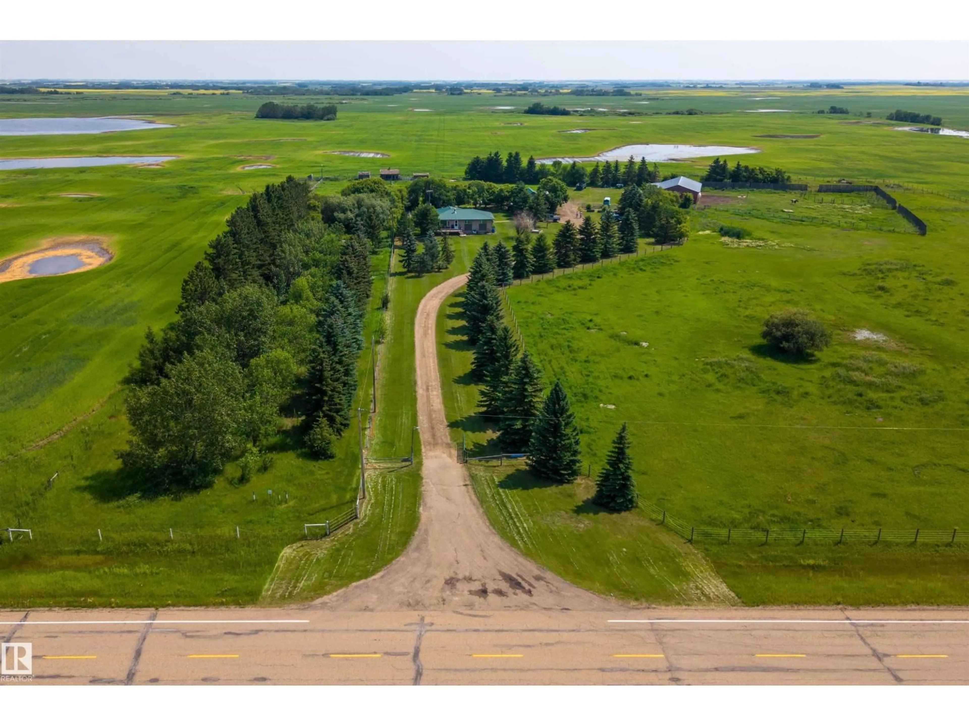 A pic from outside/outdoor area/front of a property/back of a property/a pic from drone, water/lake/river/ocean view for 854 - 46319 SEC HWY, Rural Camrose County Alberta T0B0J0
