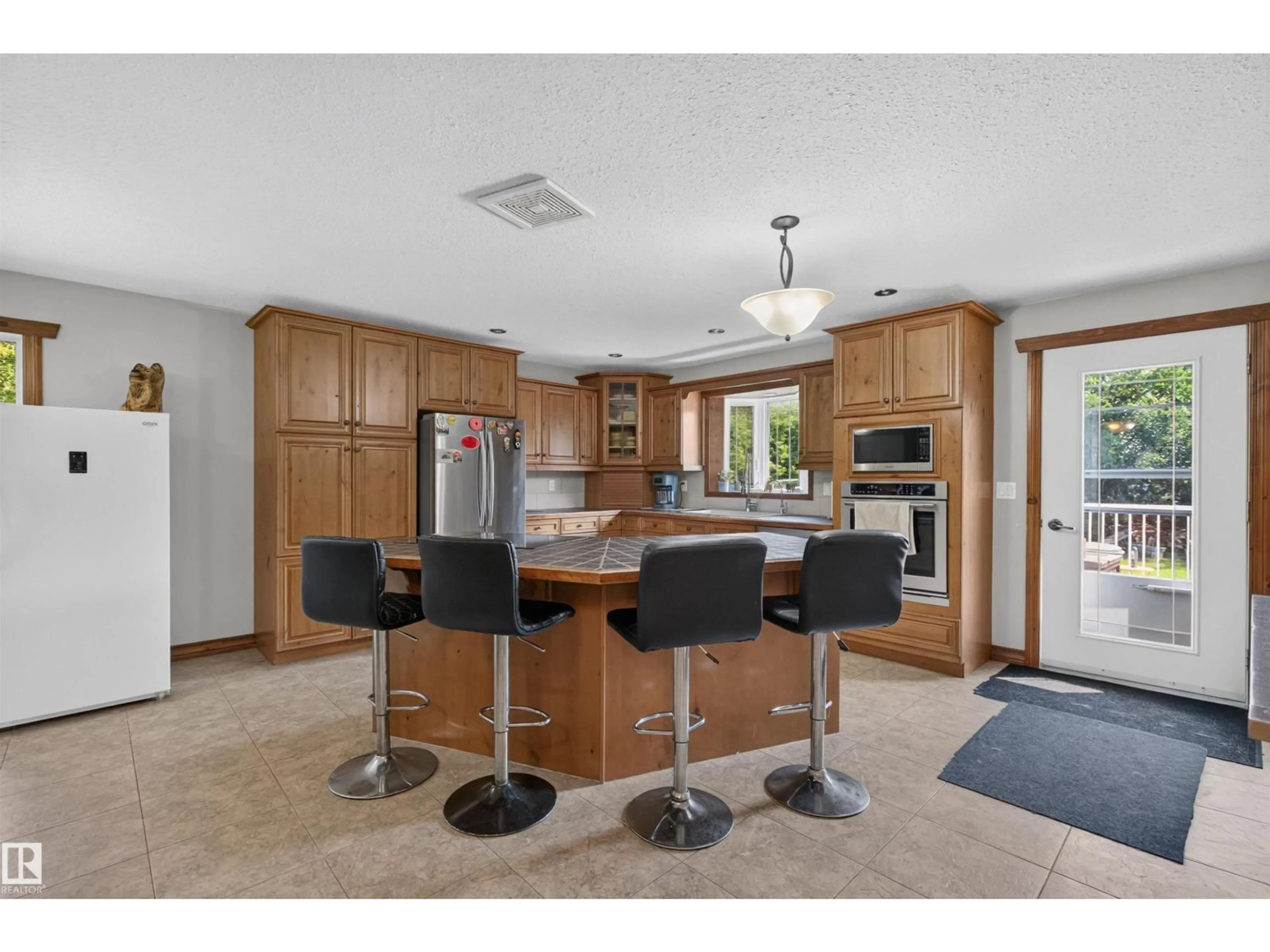 Open concept kitchen, ceramic/tile floor for 854 - 46319 SEC HWY, Rural Camrose County Alberta T0B0J0