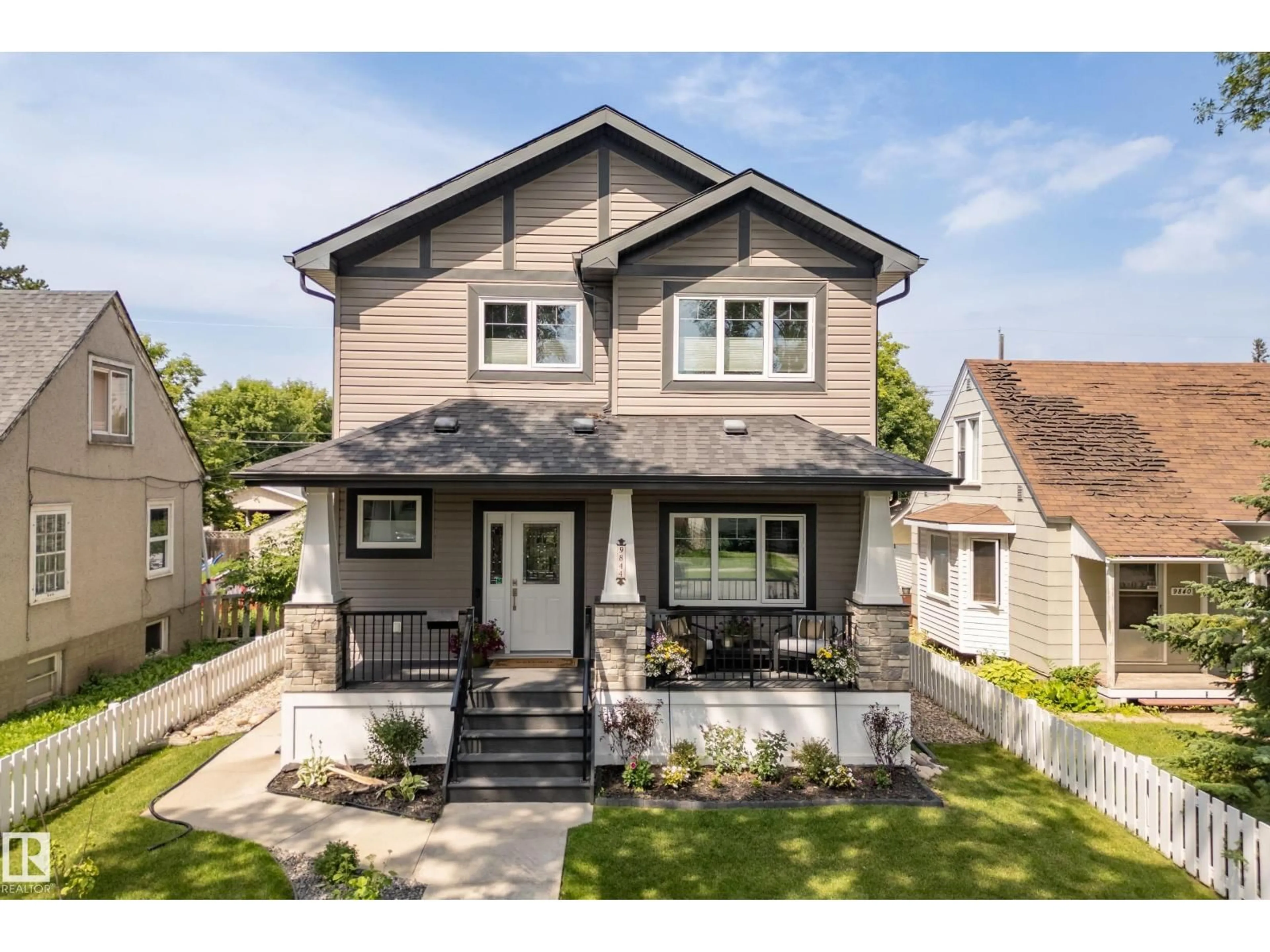 Home with vinyl exterior material, street for 9844 75 AV, Edmonton Alberta T6E1J1