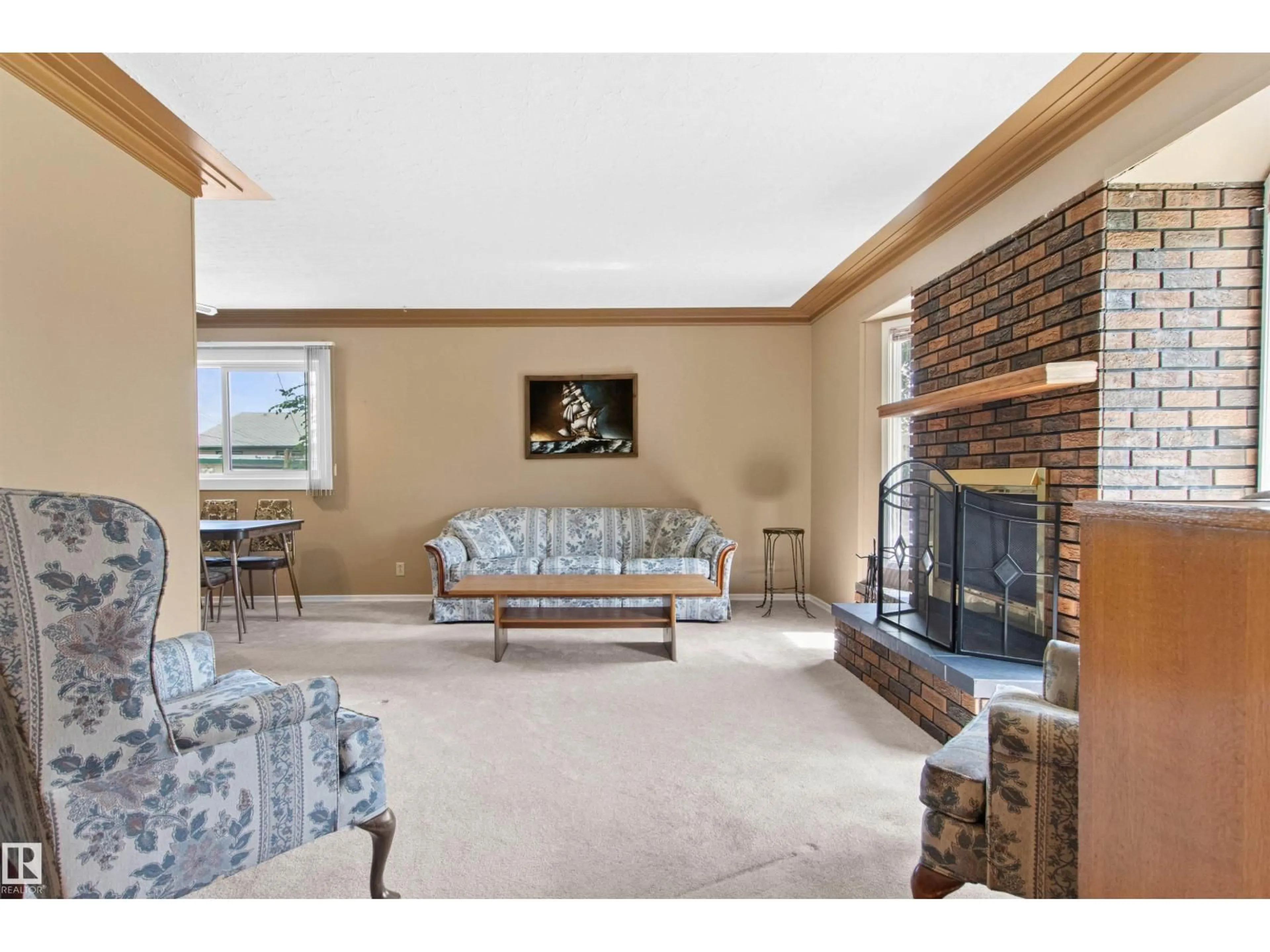Living room with furniture, unknown for 12316 135 AV, Edmonton Alberta T5L3X2