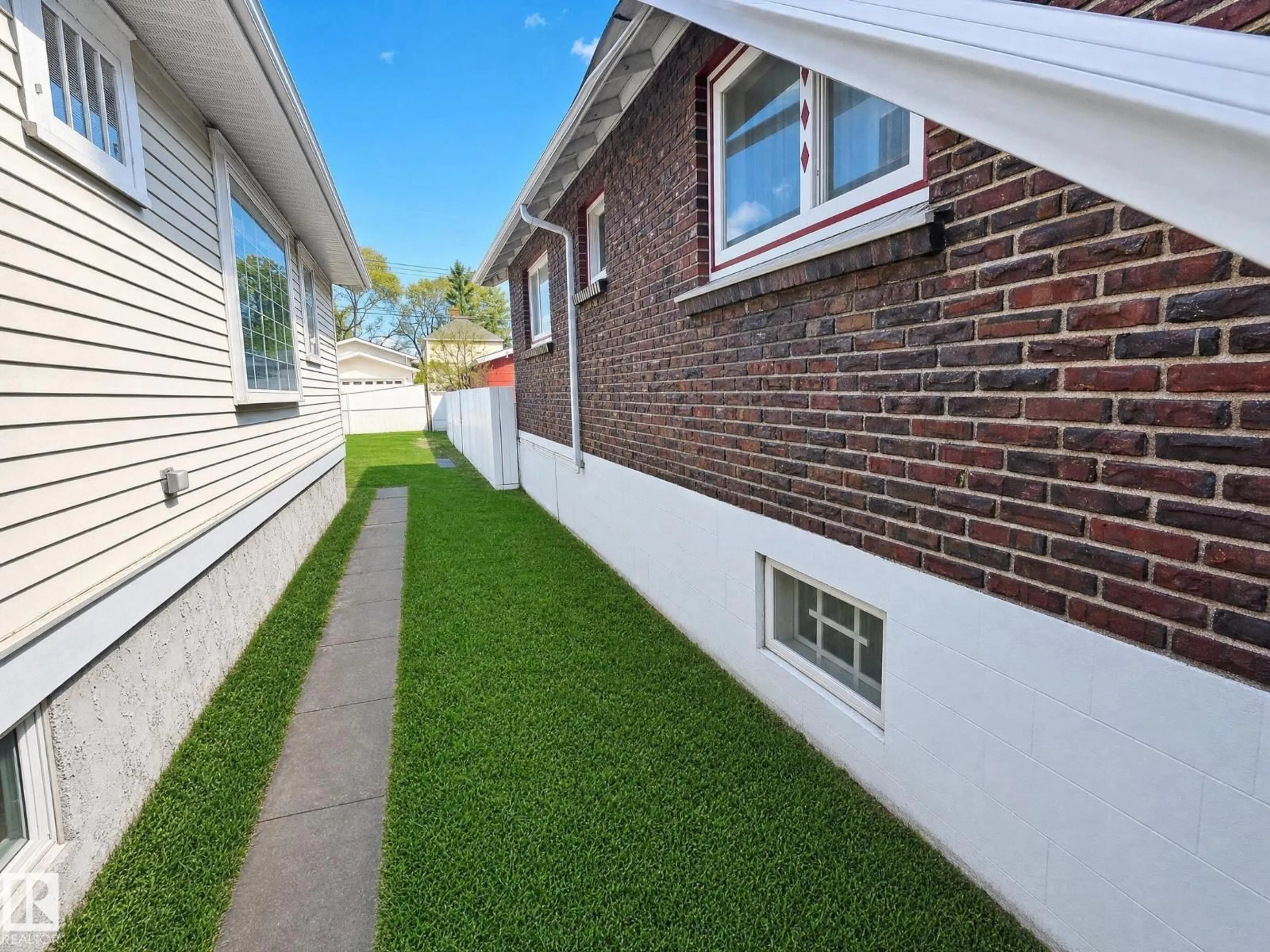 Home with brick exterior material, street for NW - 11405 97 ST, Edmonton Alberta T5G1X6