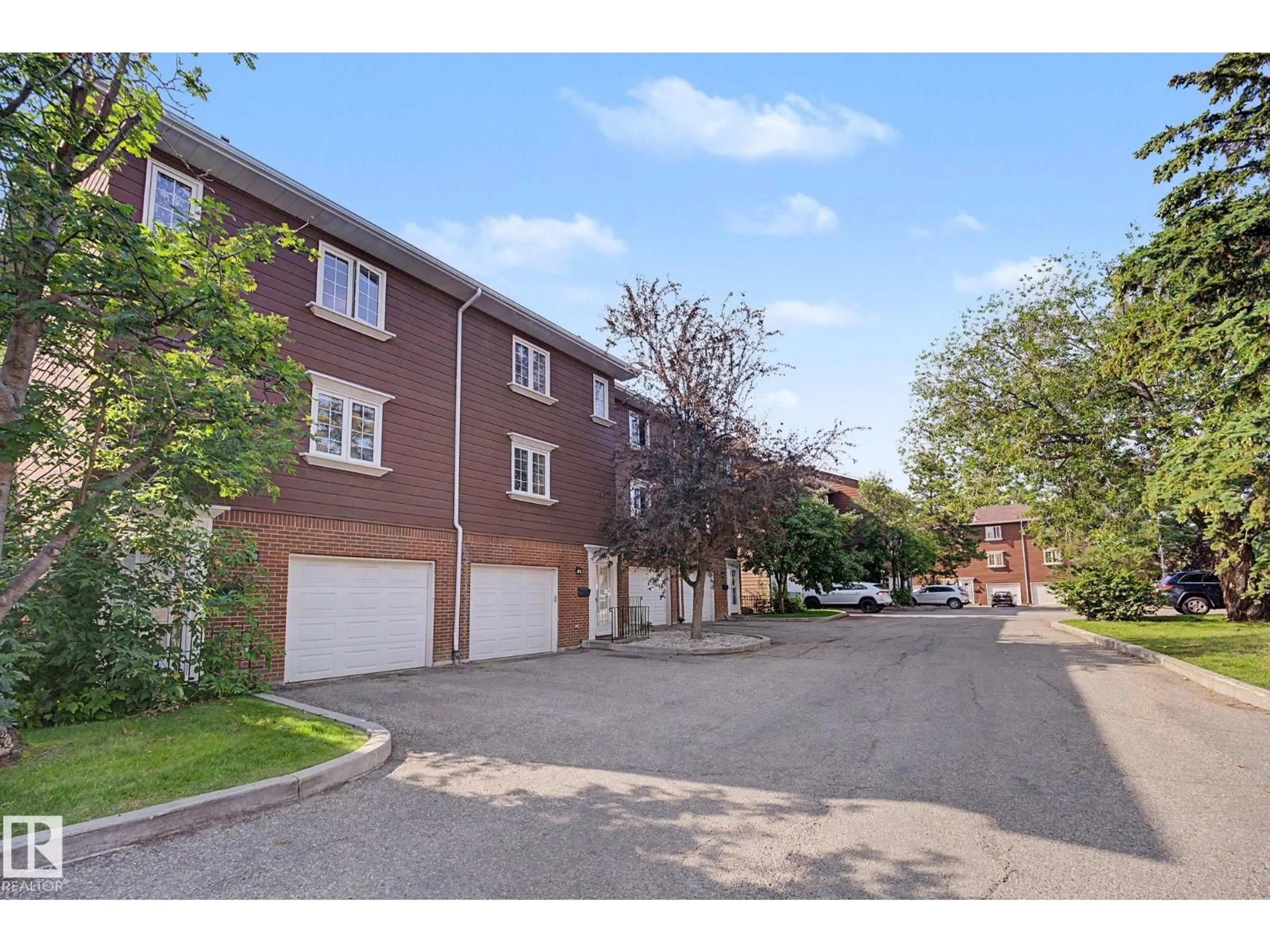 A pic from outside/outdoor area/front of a property/back of a property/a pic from drone, street for 17084 67 AV, Edmonton Alberta T5T1Y8