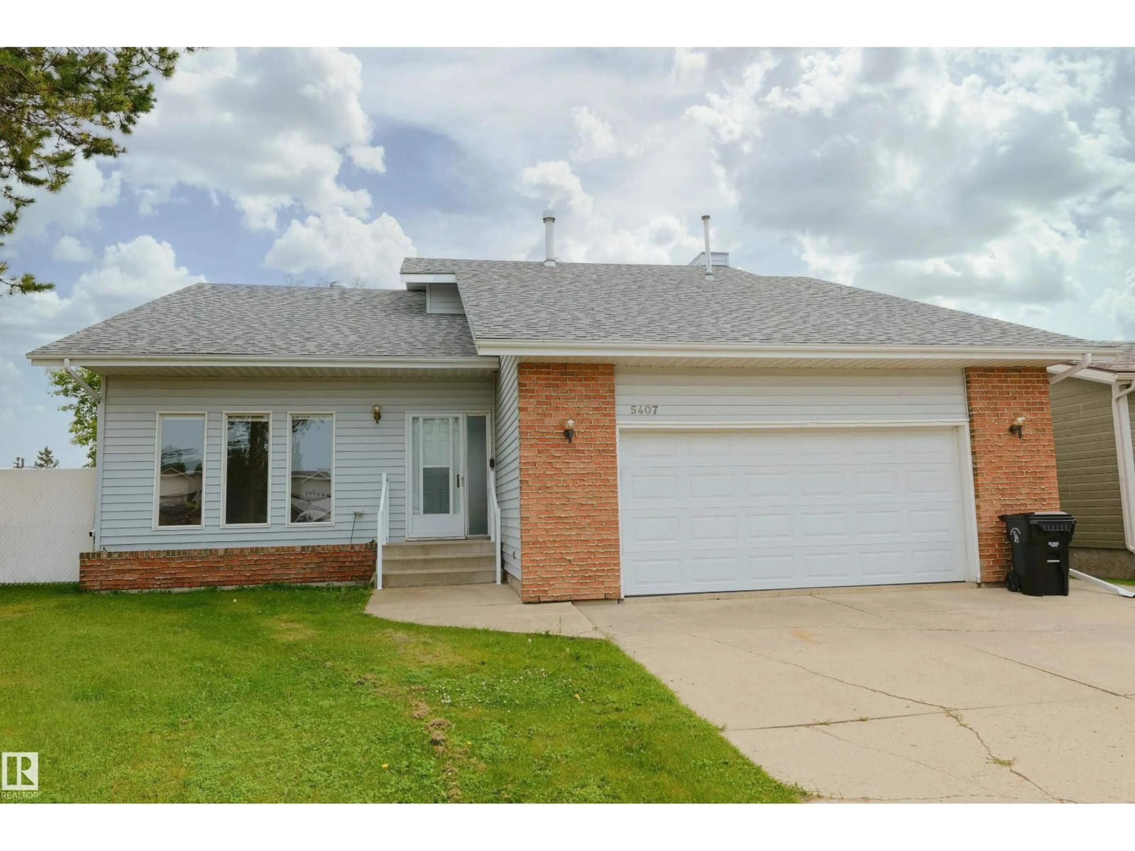 Home with brick exterior material, street for 5407 60 AVE, Barrhead Alberta T7N1E1