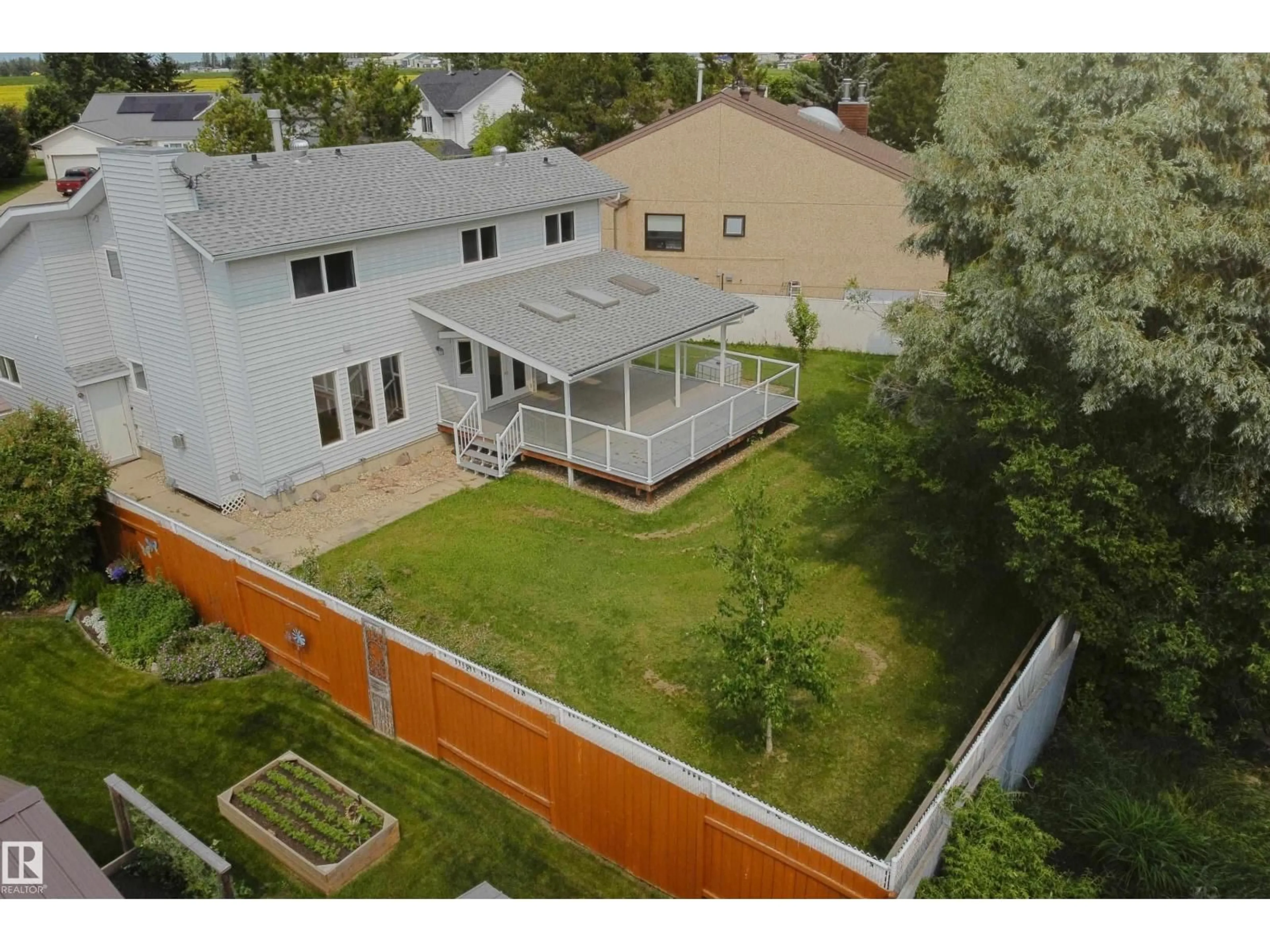 A pic from outside/outdoor area/front of a property/back of a property/a pic from drone, street for 5407 60 AVE, Barrhead Alberta T7N1E1