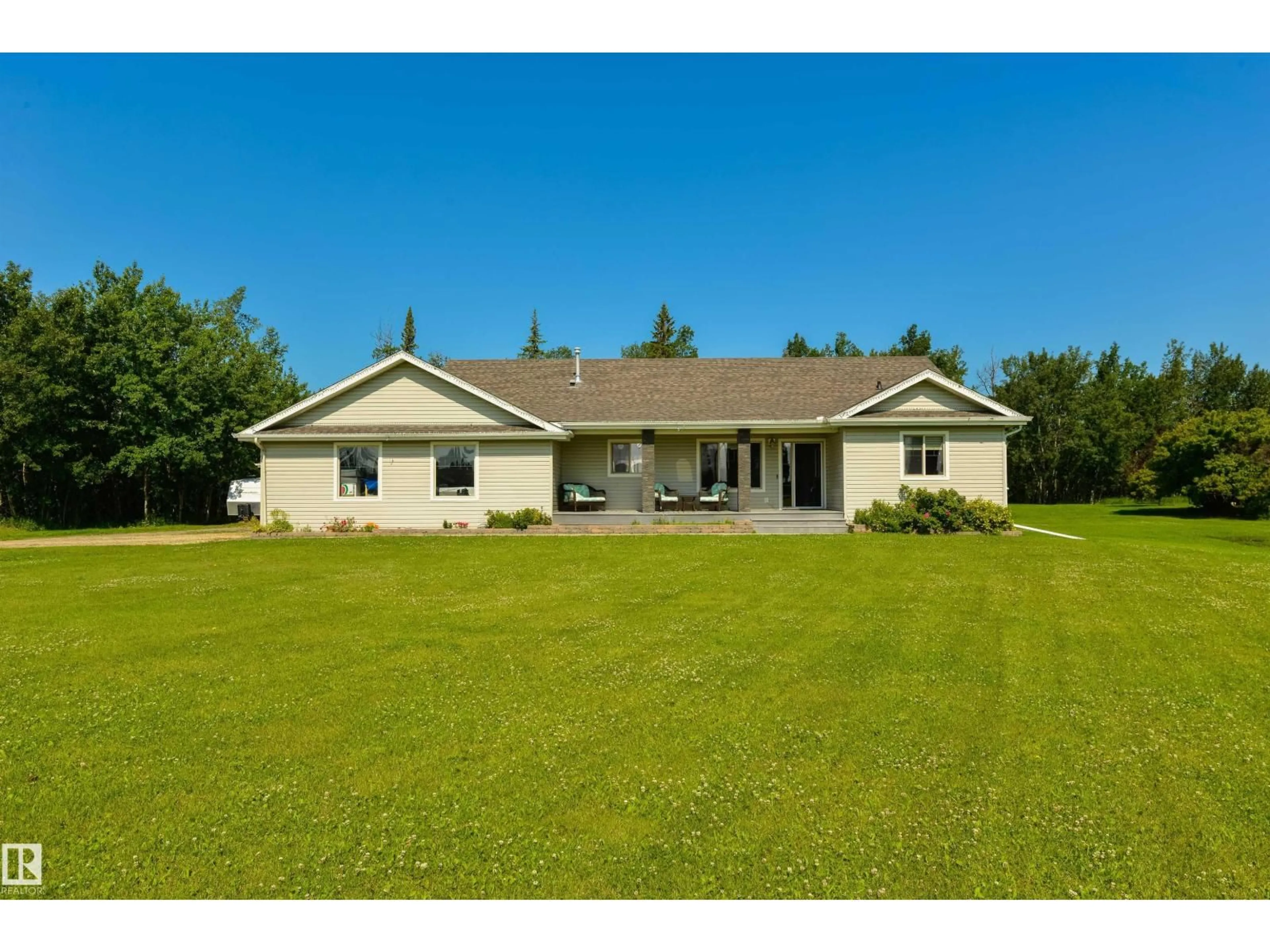 A pic from outside/outdoor area/front of a property/back of a property/a pic from drone, unknown for 45 - 53522 RGE ROAD 274, Rural Parkland County Alberta T7X3T1