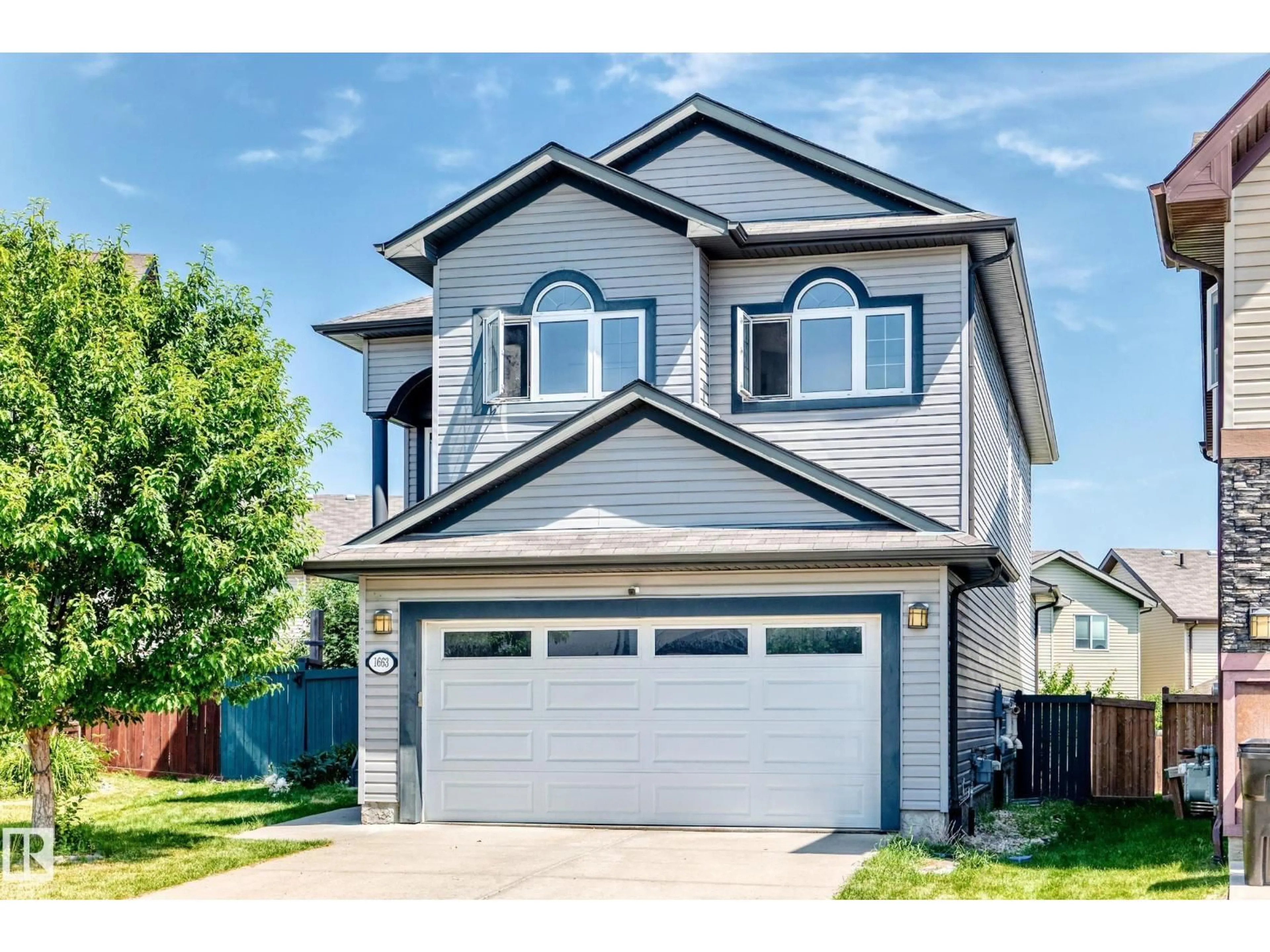 Home with vinyl exterior material, street for 1663 RUTHERFORD RD, Edmonton Alberta T6W2E5