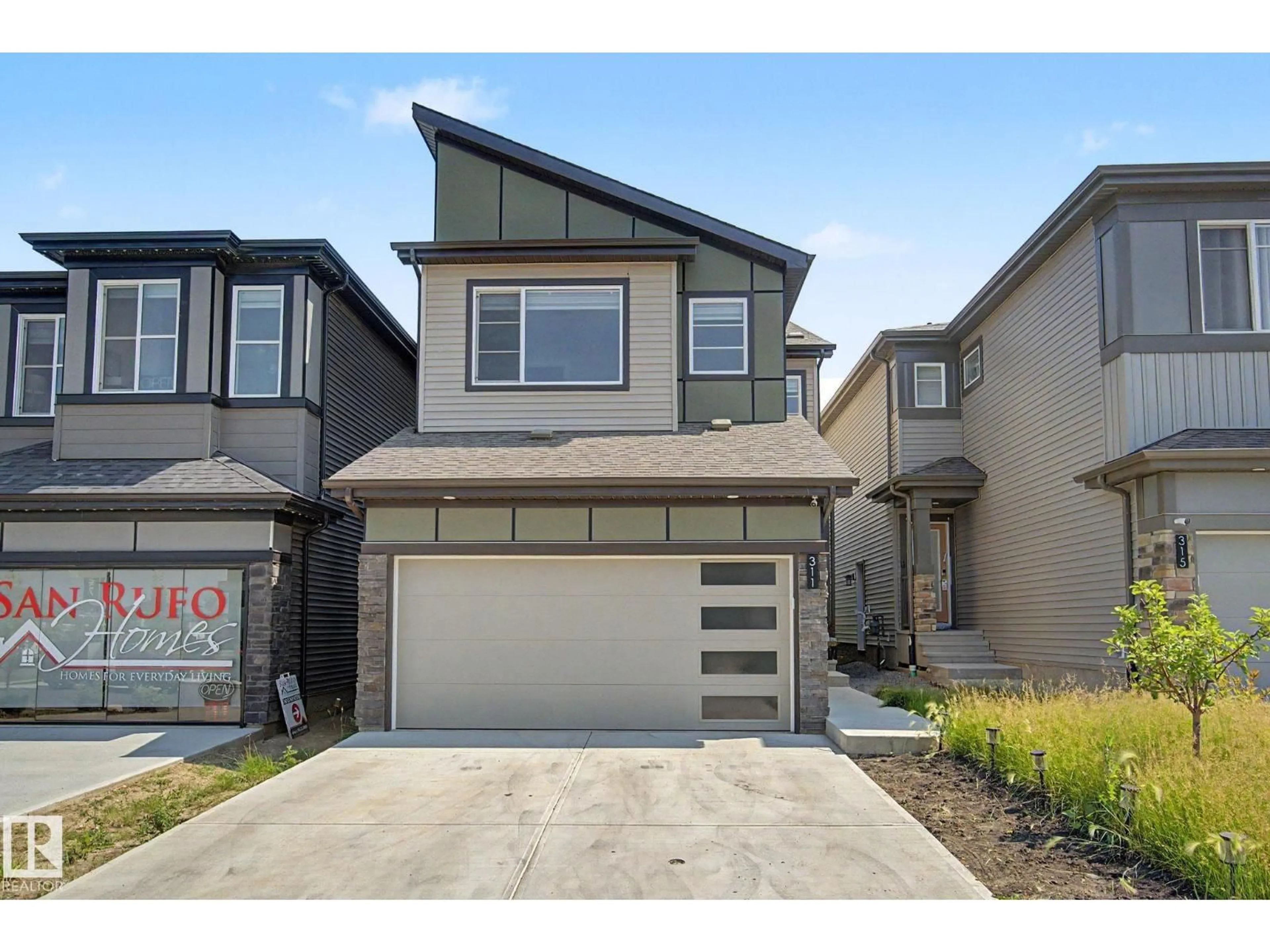 Home with vinyl exterior material, street for SW - 311 29 ST, Edmonton Alberta T6X3E7