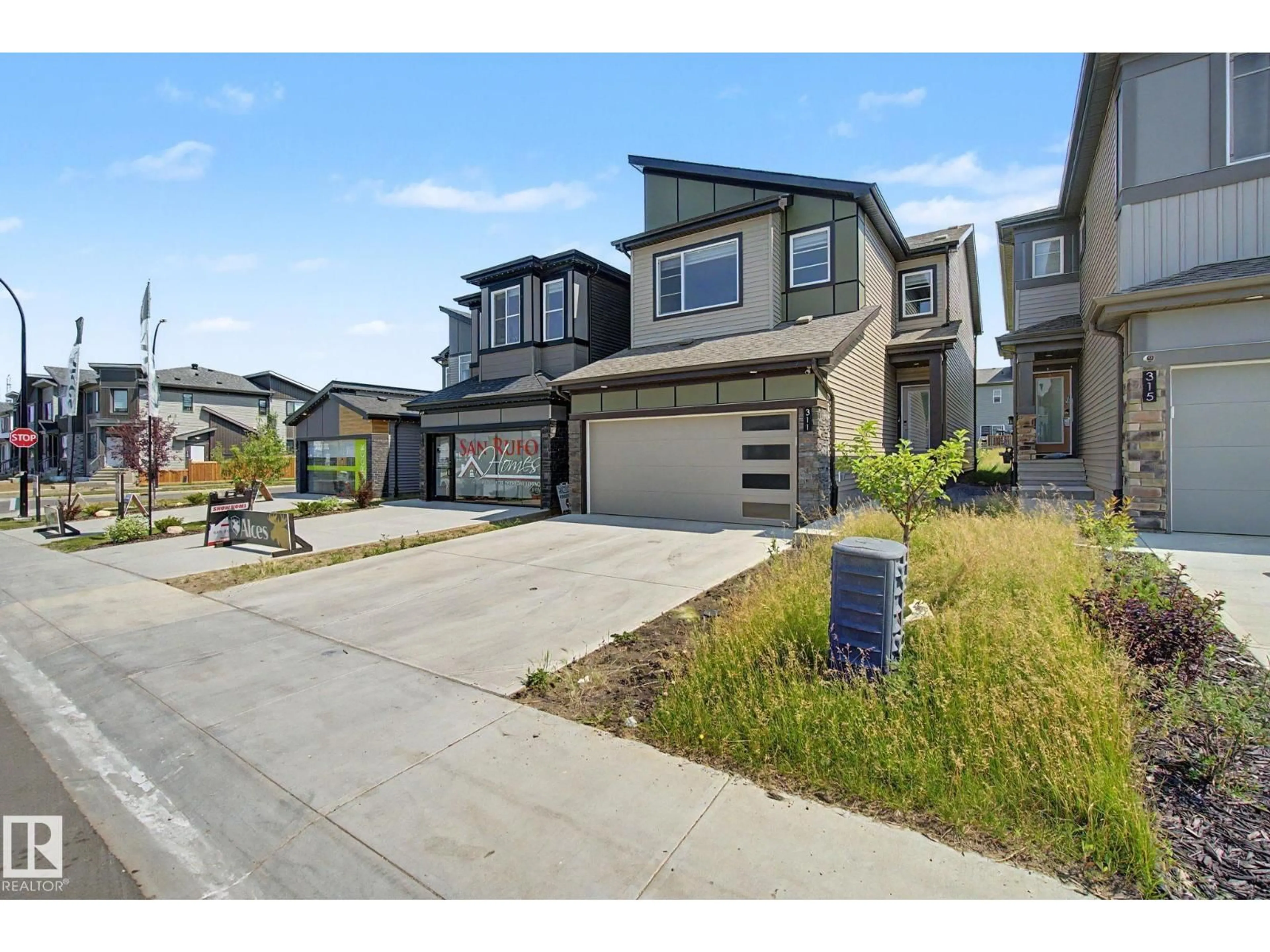 A pic from outside/outdoor area/front of a property/back of a property/a pic from drone, street for SW - 311 29 ST, Edmonton Alberta T6X3E7